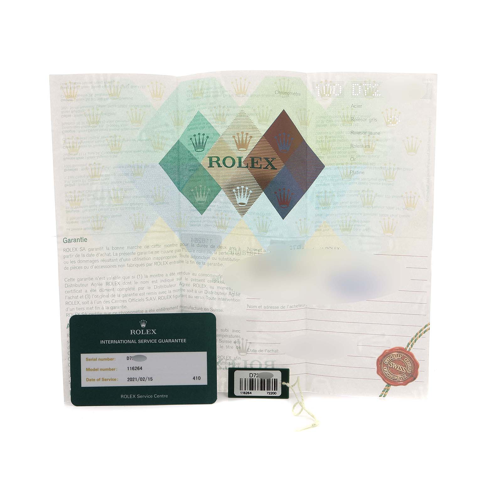 The image shows a Rolex Turn-o-Graph 116264 Men's Stainless Steel Black Dial model's warranty card and documentation, viewed from above.