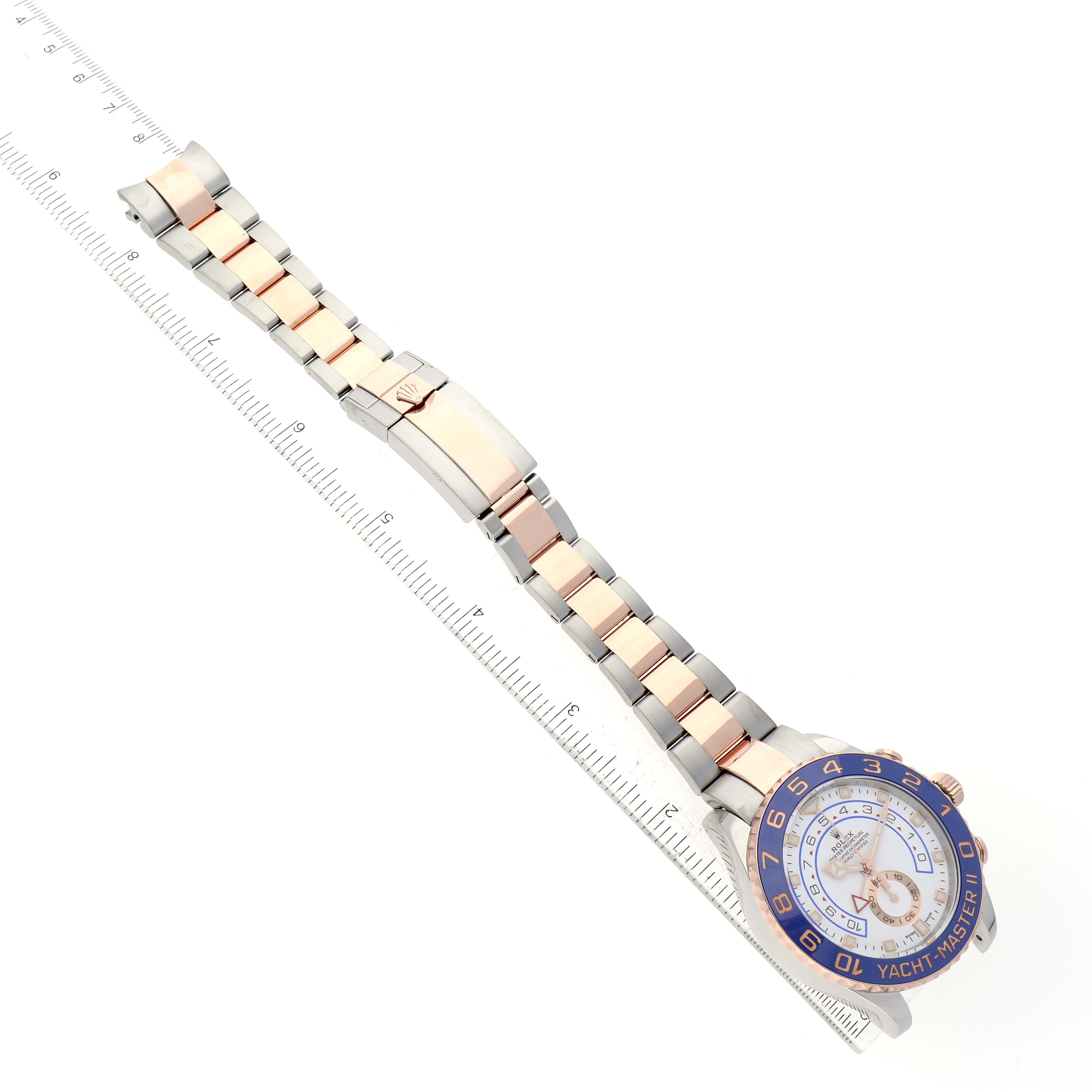 This image shows the Rolex Yacht-Master 116681 Men's Steel and Gold (two tone) White Dial 116681 Men's Steel and Gold (two tone) White Dial watch at a top-down angle, highlighting the watch face and full metal bracelet.