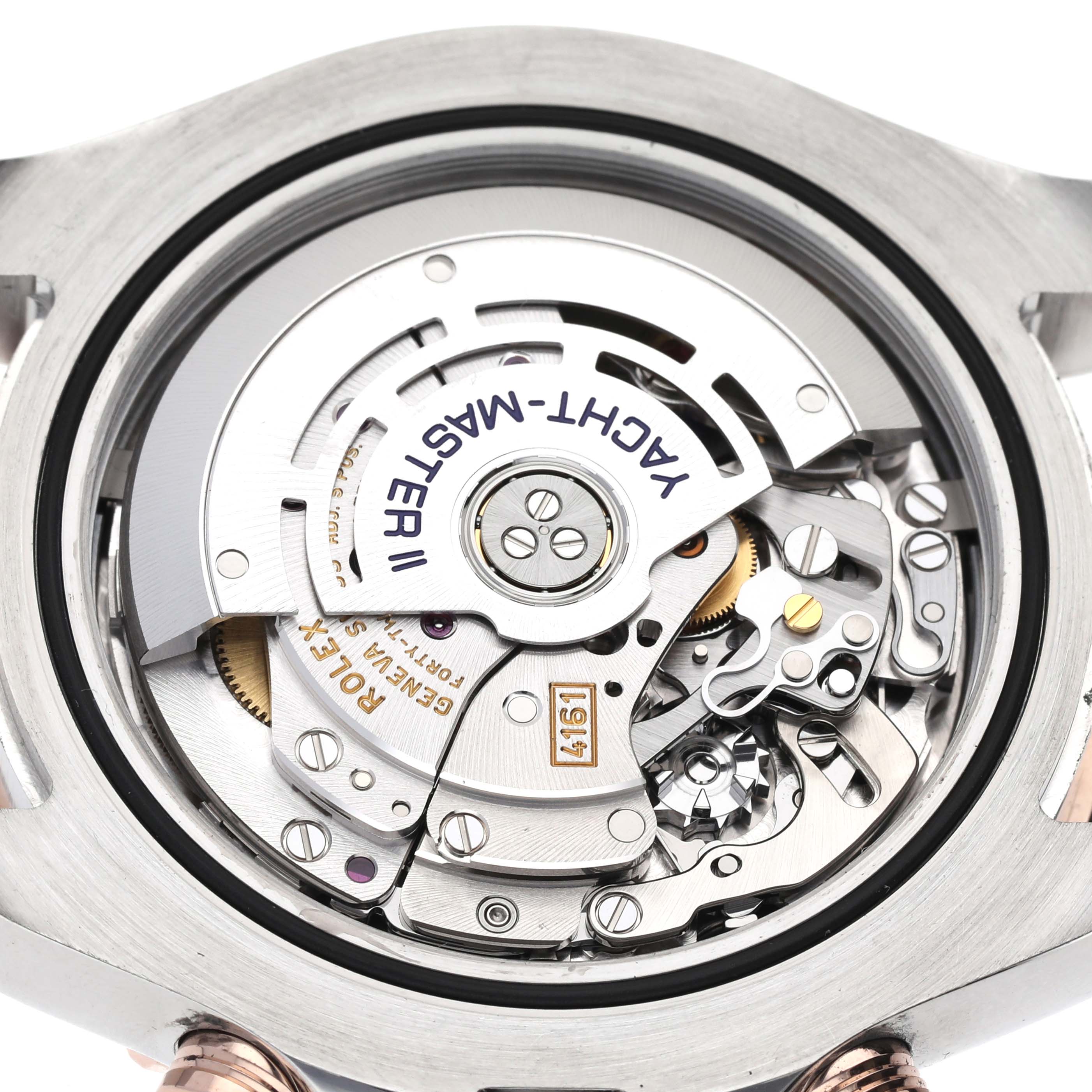 This image shows a close-up of the movement and inner mechanisms of a Rolex Yacht-Master 116681 Men's Steel and Gold (two tone) White Dial 116681 Men's Steel and Gold (two tone) White Dial II watch.