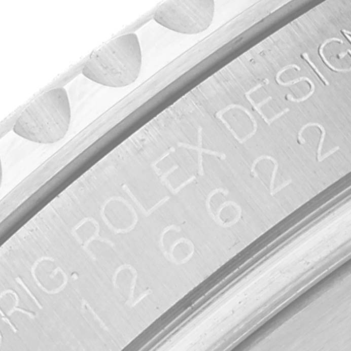 The image shows a close-up of the engraved bezel and case of a Rolex Yacht-Master 126622 Men's Stainless Steel Silver Dial 126622 Men's Stainless Steel Silver Dial watch.