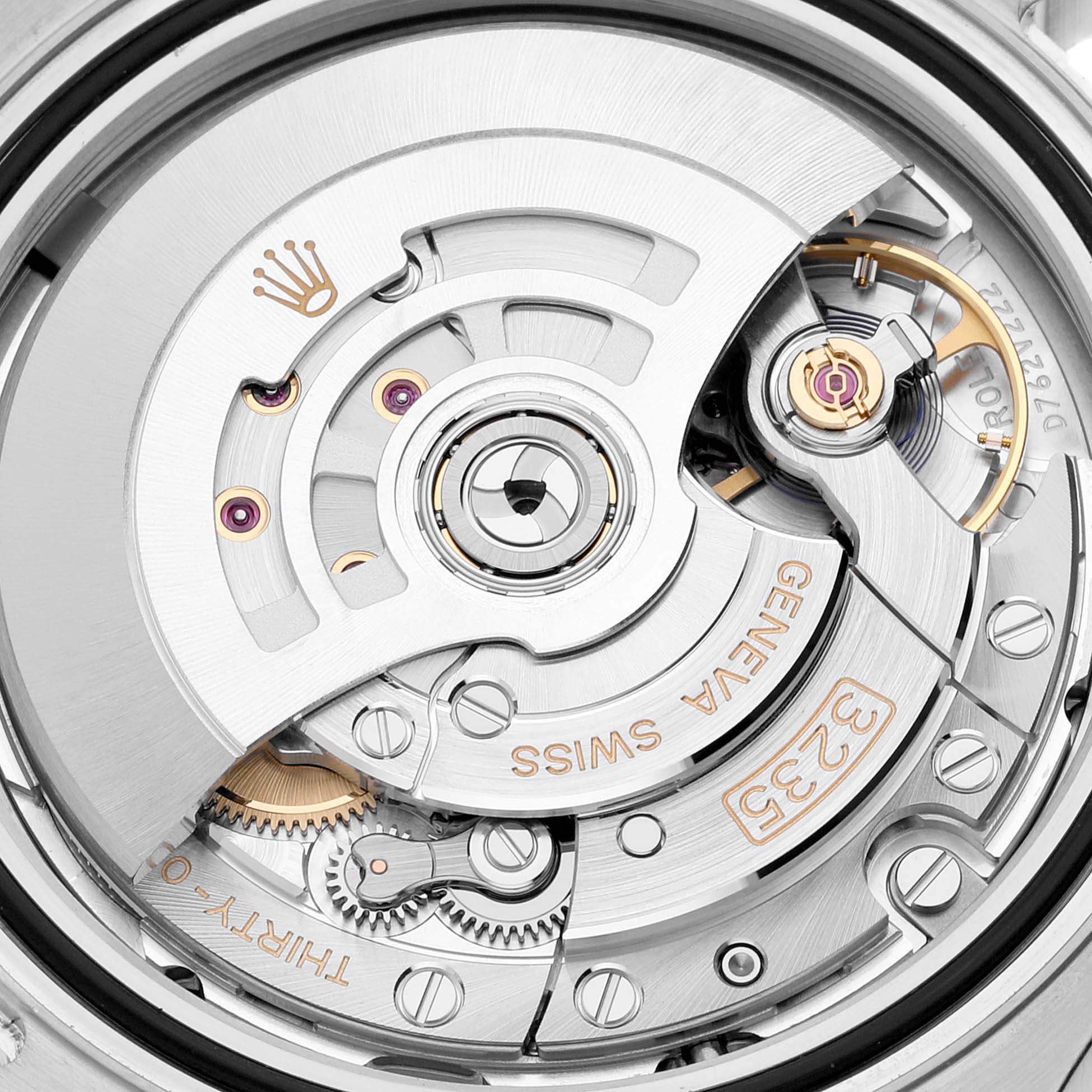 The image shows a close-up of the Rolex Yacht-Master 126622 Men's Stainless Steel Silver Dial 126622 Men's Stainless Steel Silver Dial model's movement, highlighting the intricate gears and components.