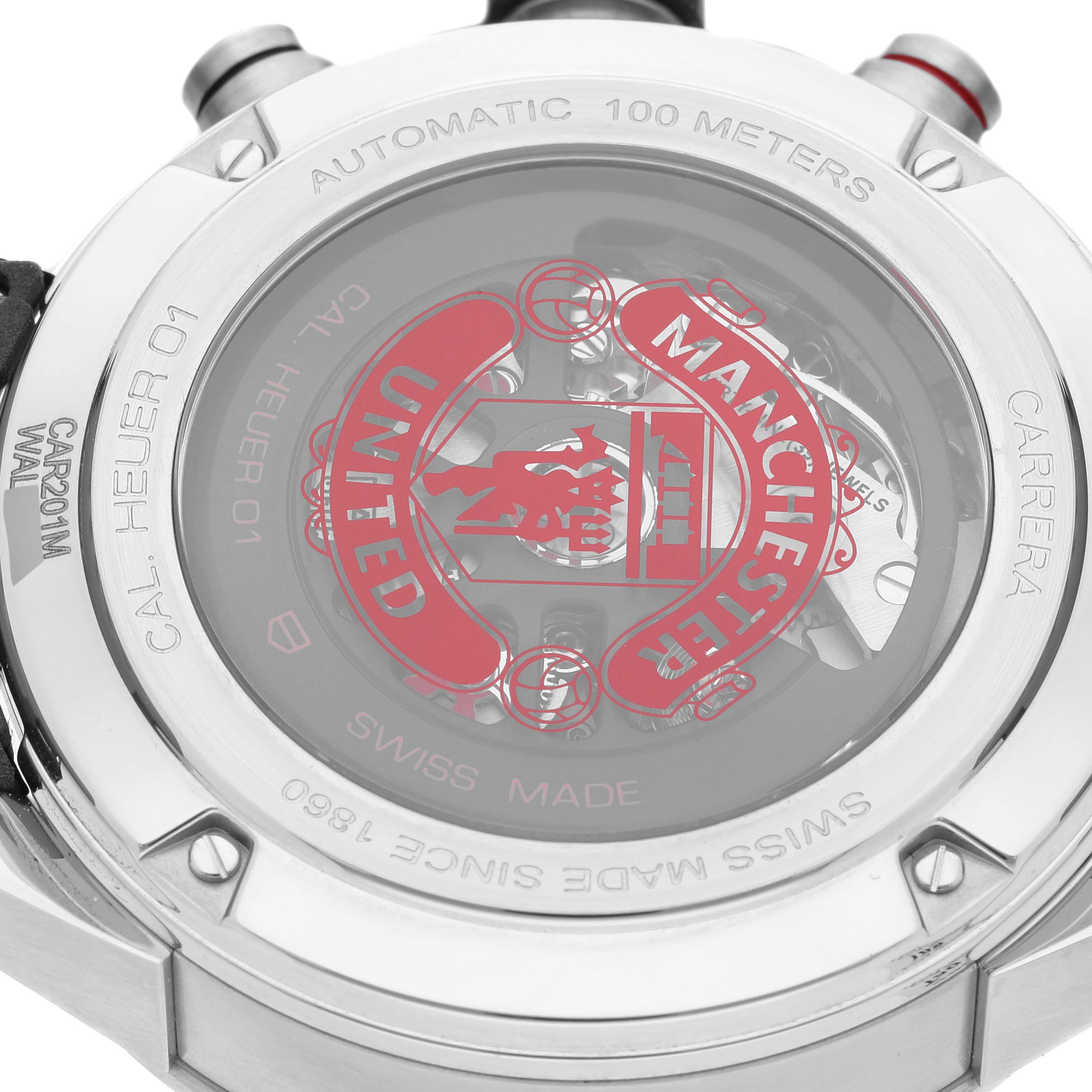 The image shows the case back of a Tag Heuer Carrera watch, highlighting its automatic movement and Manchester United design.