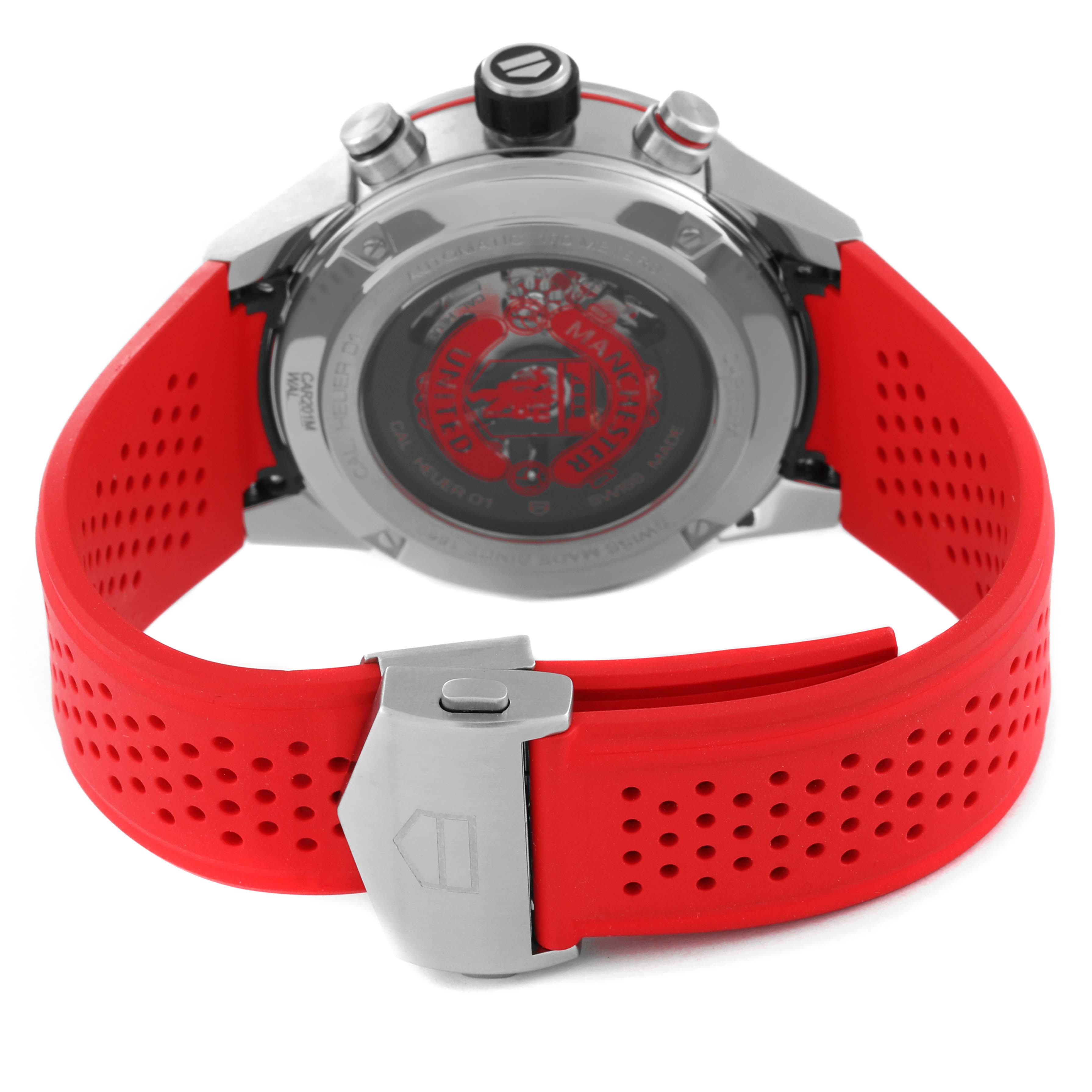 The image shows the back view of the Tag Heuer Carrera watch with a red perforated strap and the clasp.