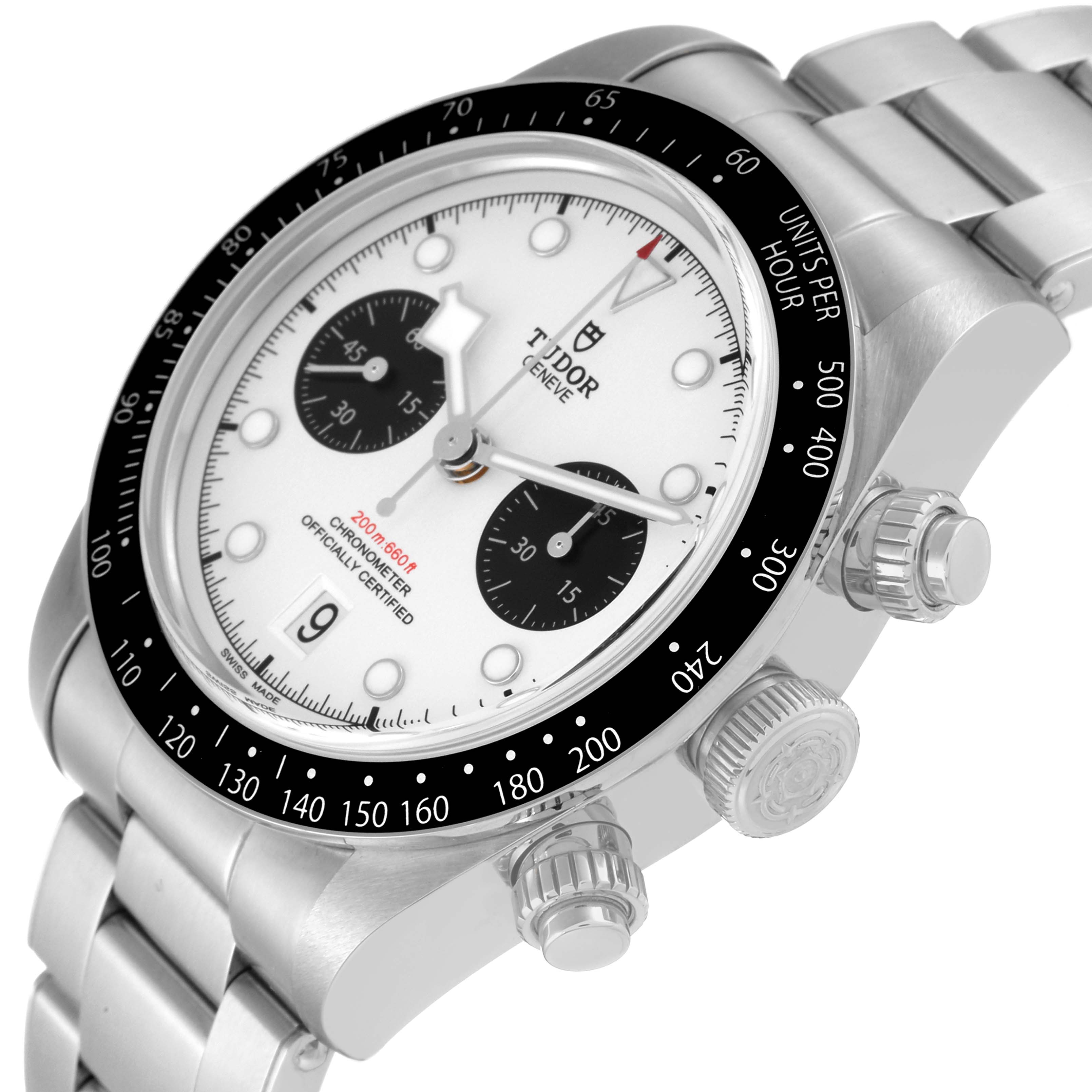 The image shows a Heritage Black Bay model by Tudor at a tilted angle, highlighting the dial, bezel, crown, and pushers.