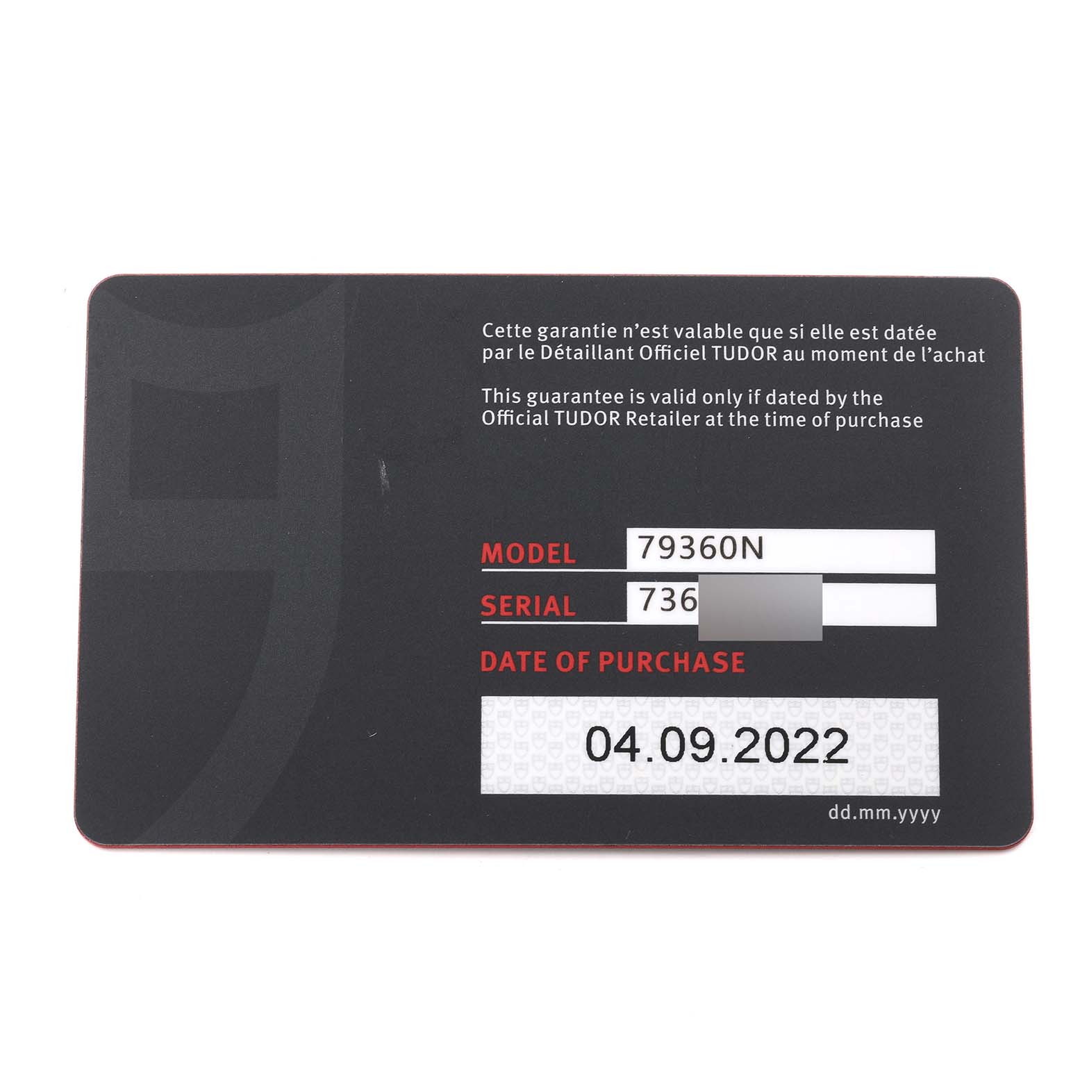 This is a warranty card for the Tudor Heritage Black Bay M79360N-0002 Men's Stainless Steel White Dial M79360N-0002 Men's Stainless Steel White Dial model 79360N.