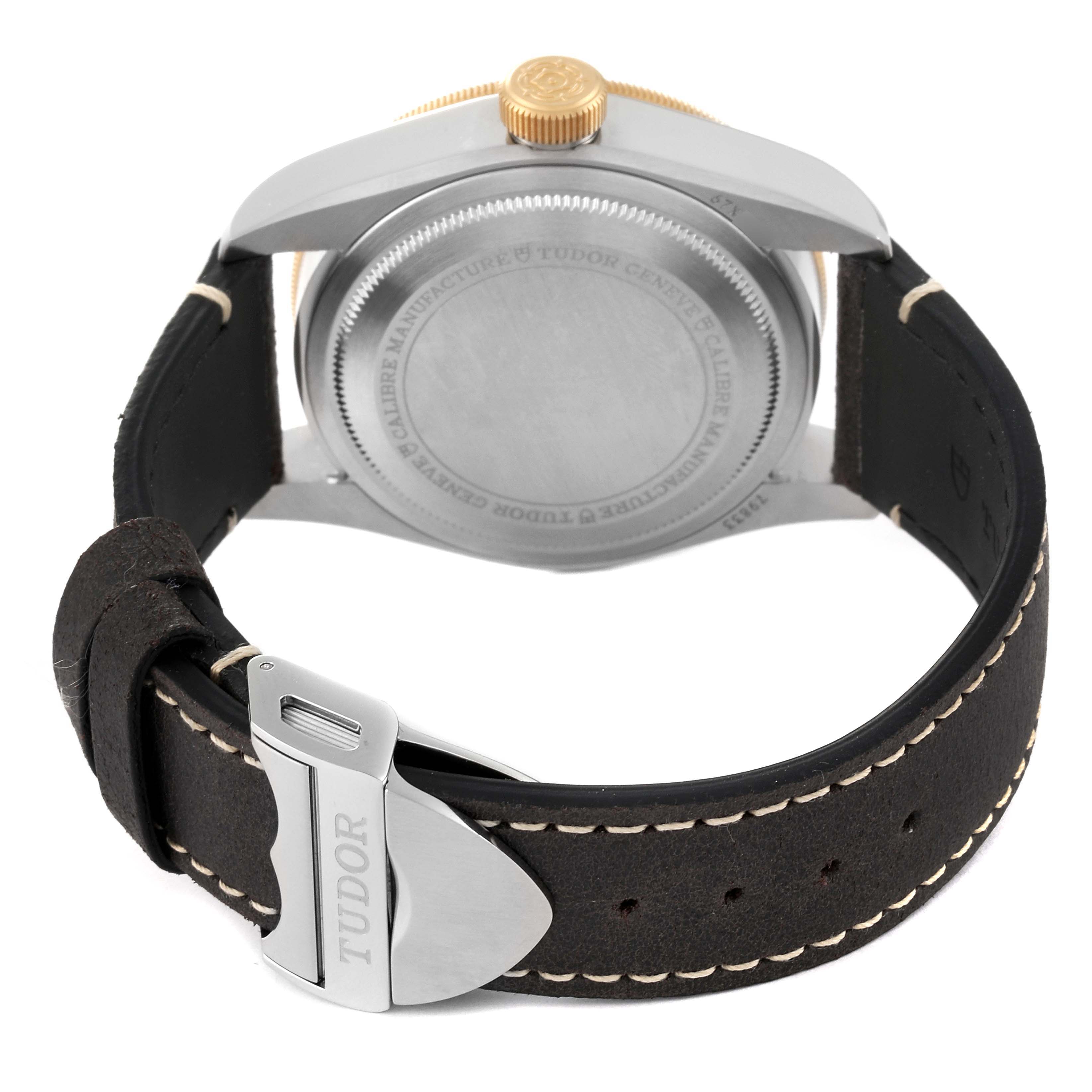 This image shows the back case and clasp of the Tudor Heritage Black Bay 79833MN Men
s Stainless Steel Black Dial 79833MN Men
s Stainless Steel Black Dial watch, featuring the strap and branding.