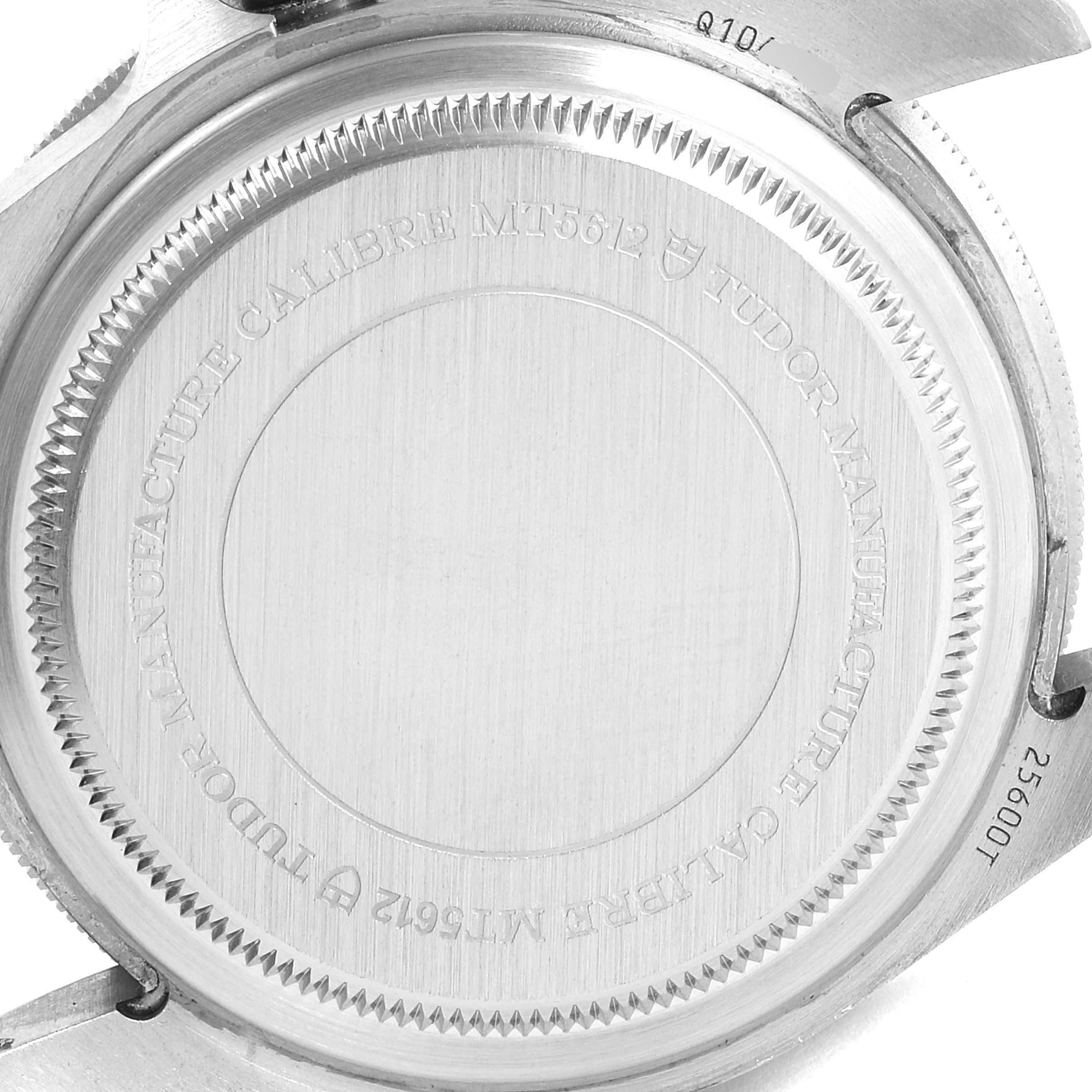 The image shows the case back of a Tudor Pelagos 25500TN Men's Titanium Black Dial 25500TN Men's Titanium Black Dial watch with inscriptions detailing the calibre and manufacturer.