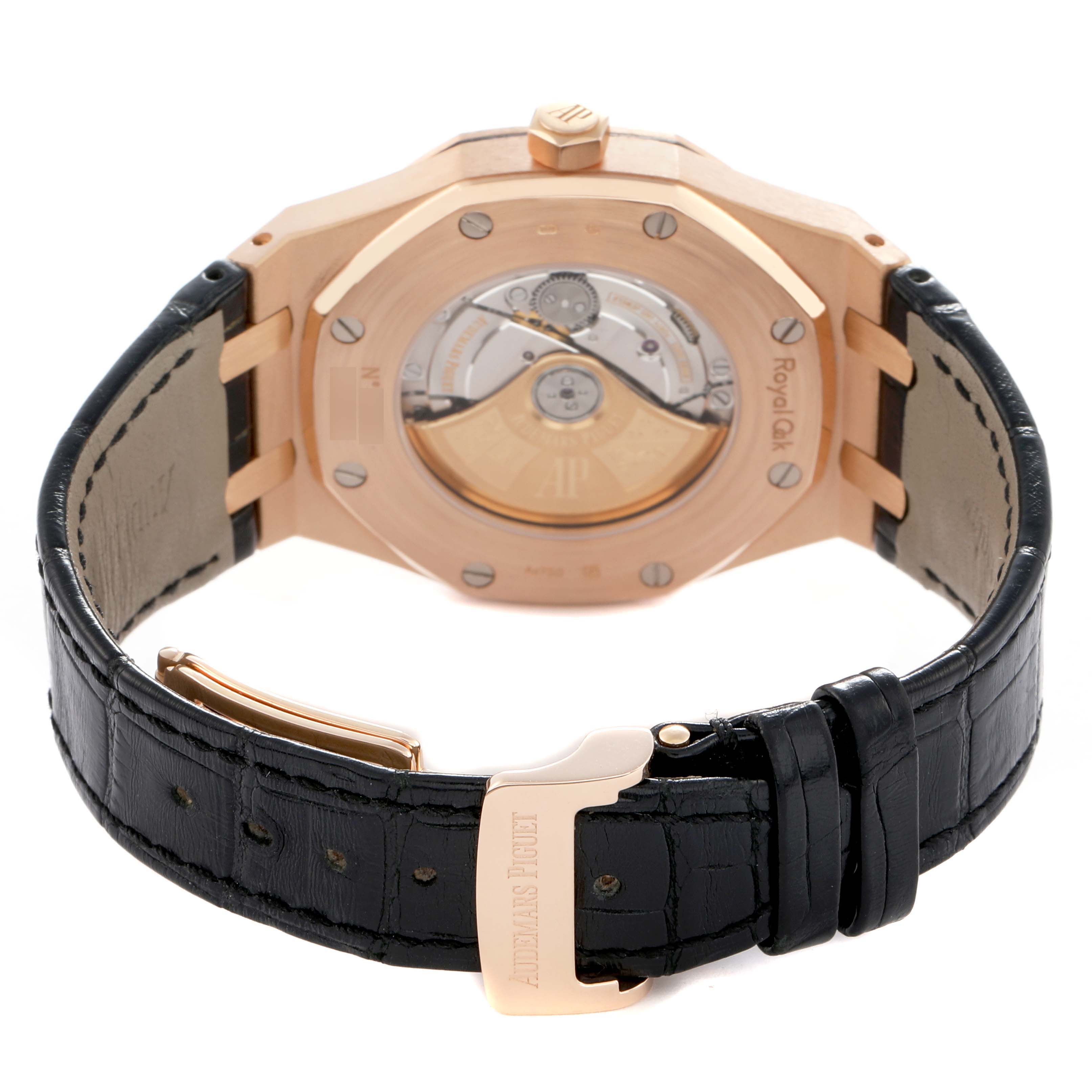 The image shows the back of the Audemars Piguet Royal Oak 15400OR Men
s Rose Gold Black Dial model, highlighting its movement and black strap.