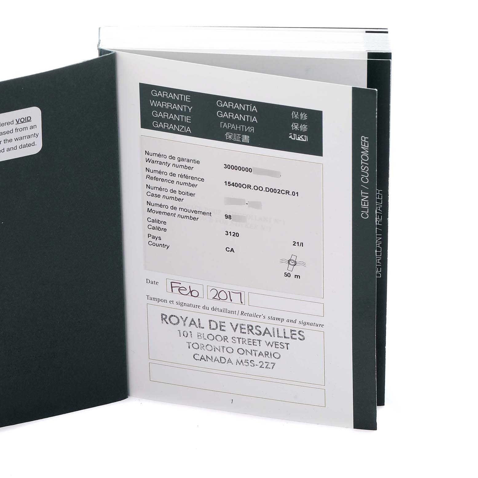 The image shows the warranty booklet for a Royal Oak model by Audemars Piguet, displaying warranty information and retailer details.