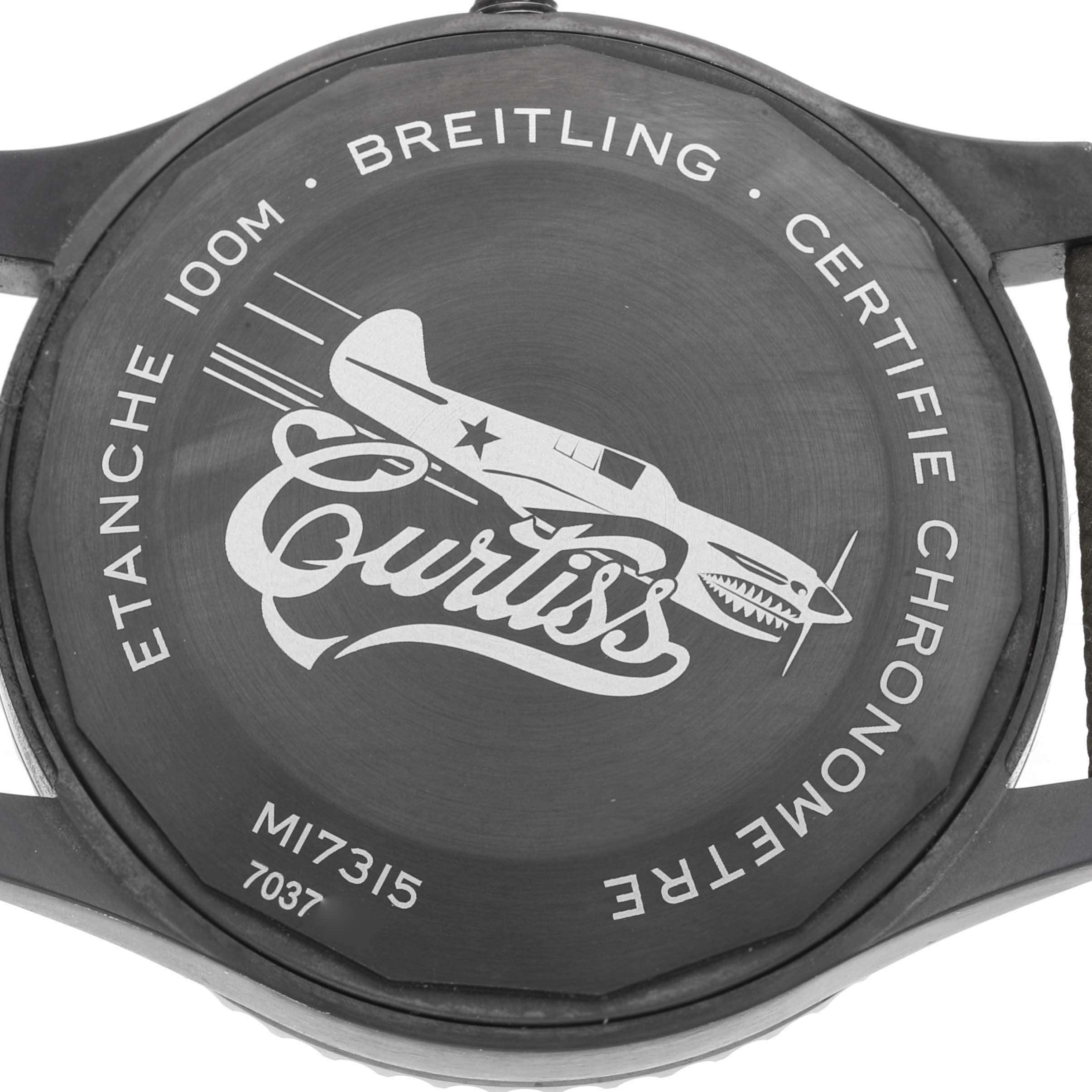 This image shows the back case of a Breitling Navitimer watch, featuring branding, a plane illustration, and model details.