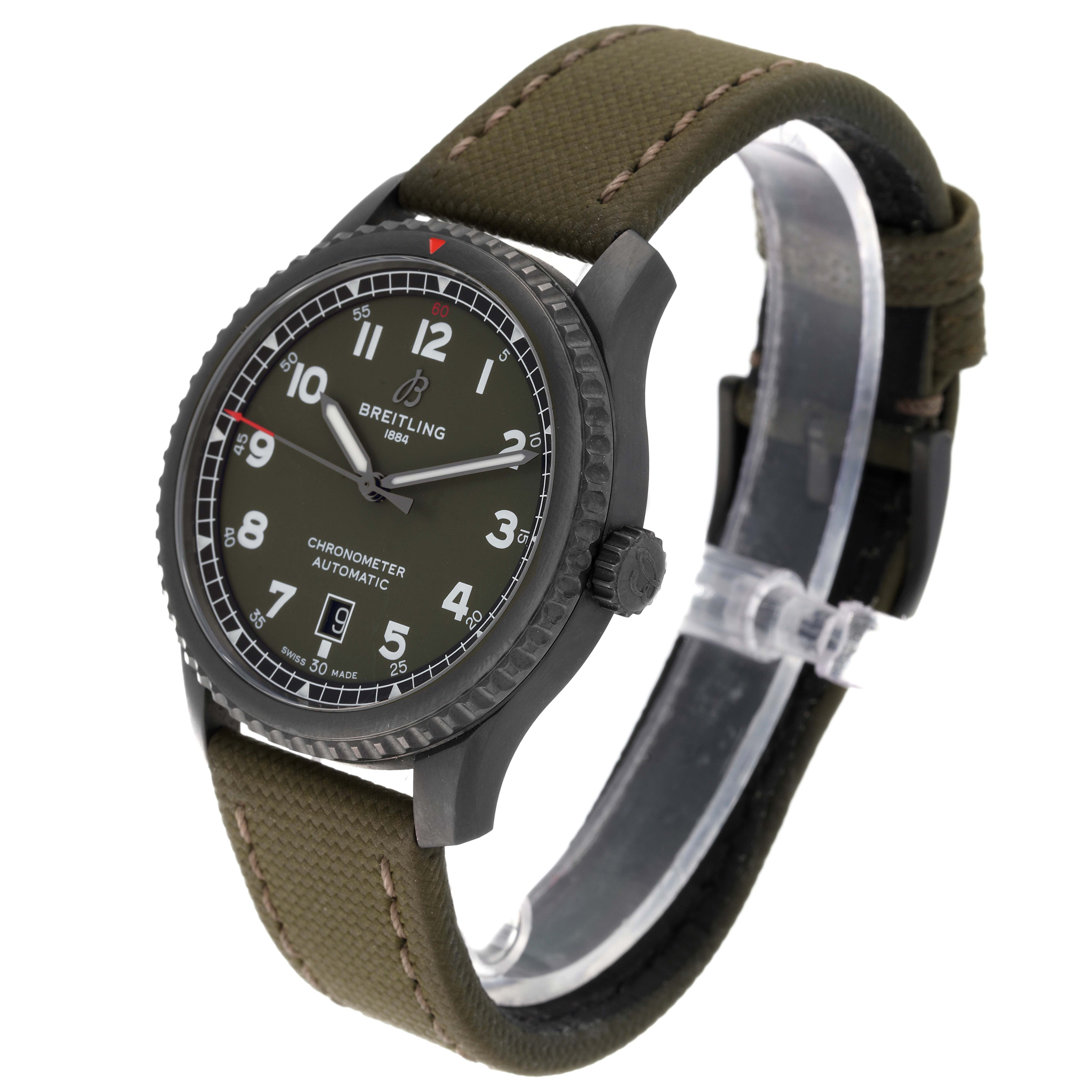 The image shows a side view of a Breitling Navitimer watch, highlighting the face, bezel, crown, and strap.