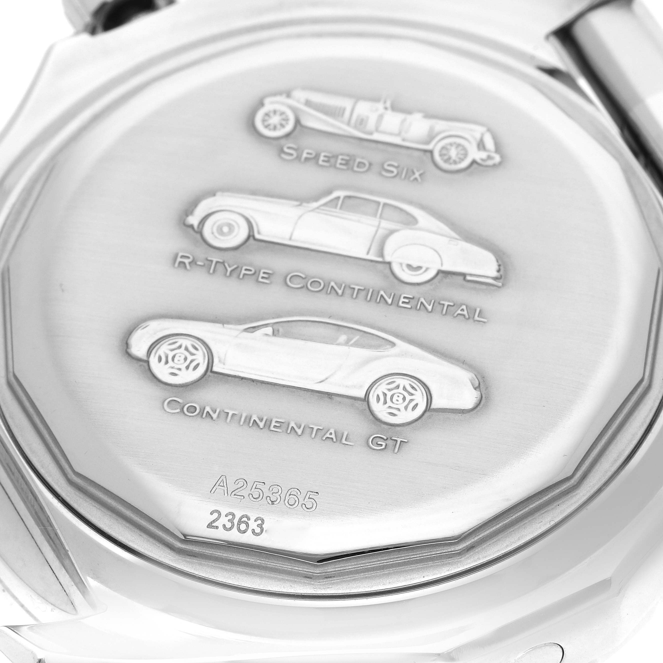 The image shows the back of a Breitling Bentley A25365 Men
s Stainless Steel Blue Dial watch featuring engravings of car models and serial numbers.