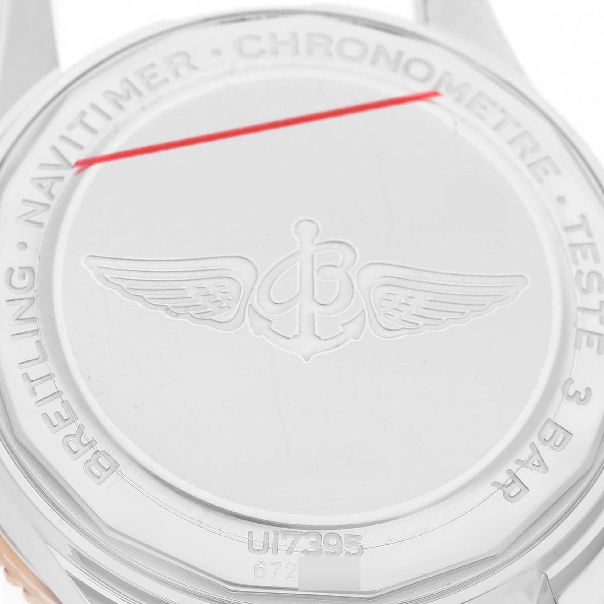 The image shows the back case of the Breitling U17395 Women's Stainless Steel Mother of Pearl Dial Navitimer 35 Steel Diamond Dial Ladies Watch U17395, featuring engraved branding and text.