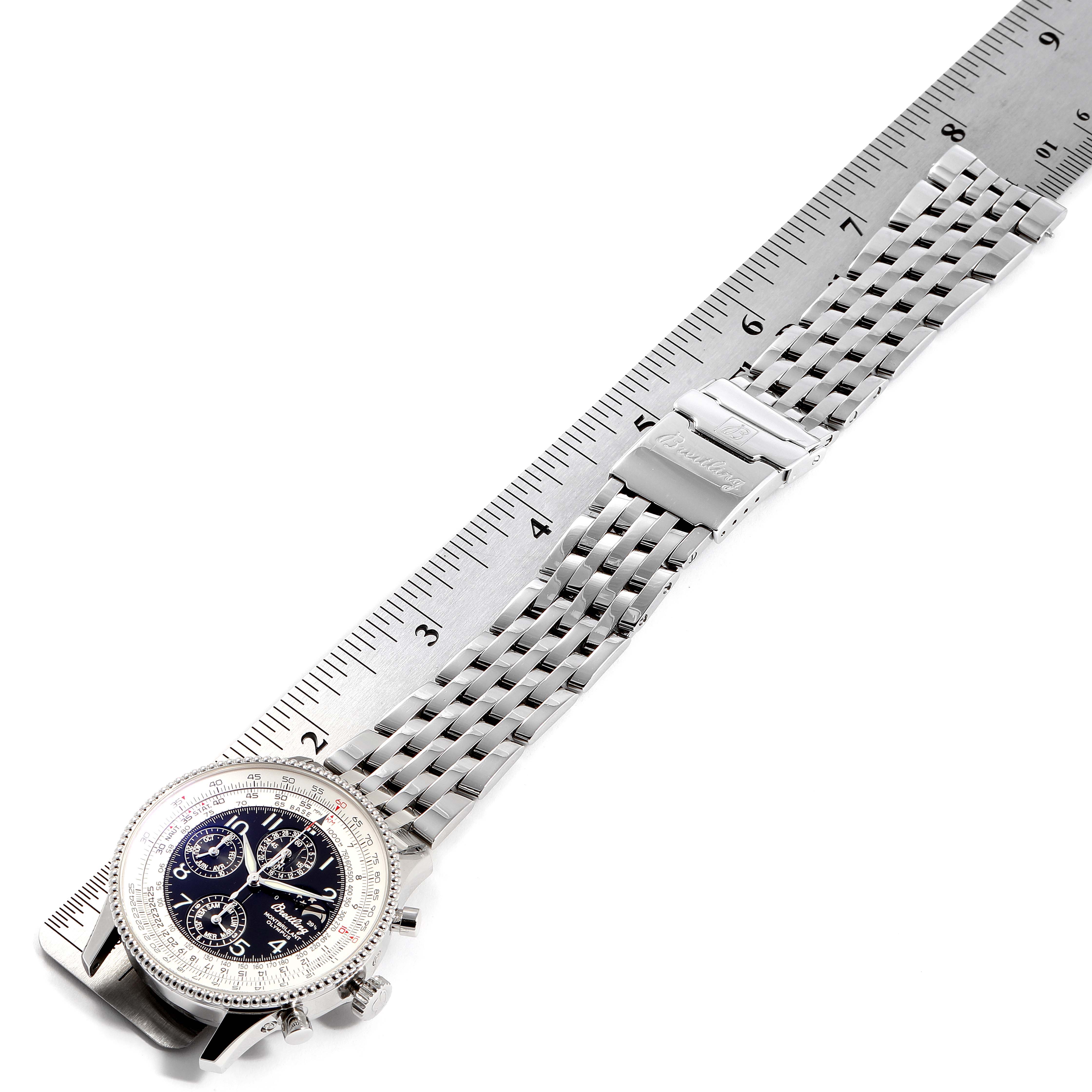 The image shows a Breitling Navitimer A19350 Men's Stainless Steel Silver Dial A19350 Men's Stainless Steel Silver Dial watch laid flat with its metal bracelet next to a ruler for size reference.