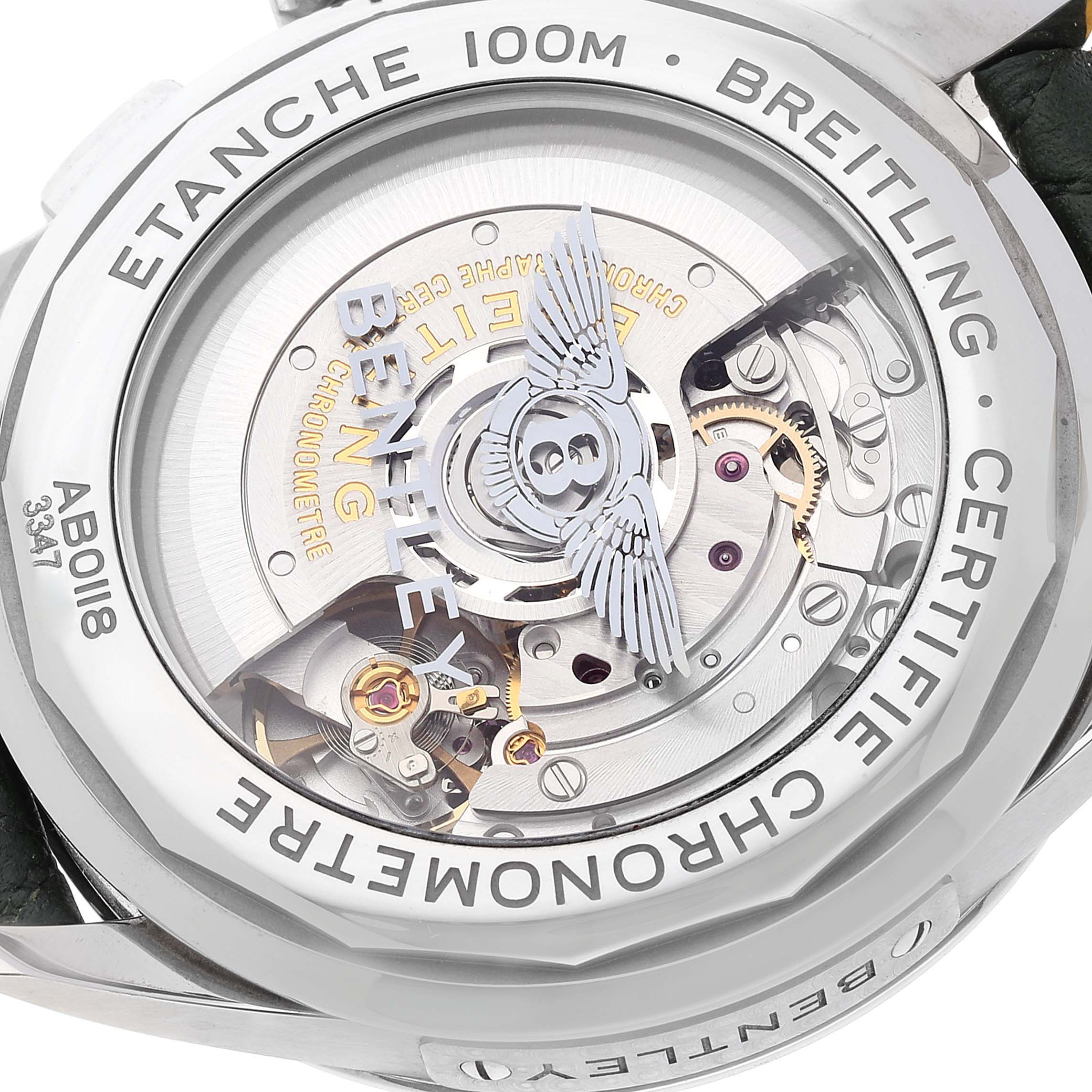 The image shows the open case back of a Breitling Premier AB0118 Men
s Stainless Steel Green Dial AB0118 Men
s Stainless Steel Green Dial model, revealing the intricate mechanism inside.