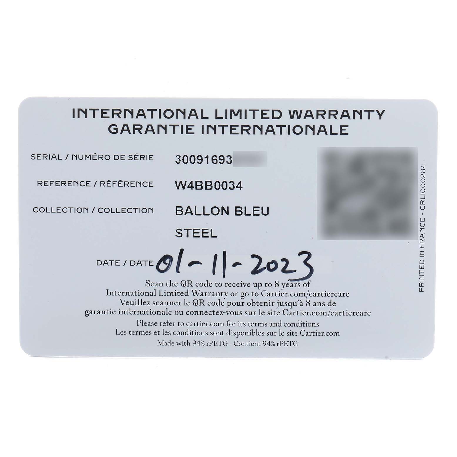 This image shows the warranty card for the Cartier Ballon Bleu W4BB0034 Women's Stainless Steel Silver Dial watch, detailing serial and reference numbers.