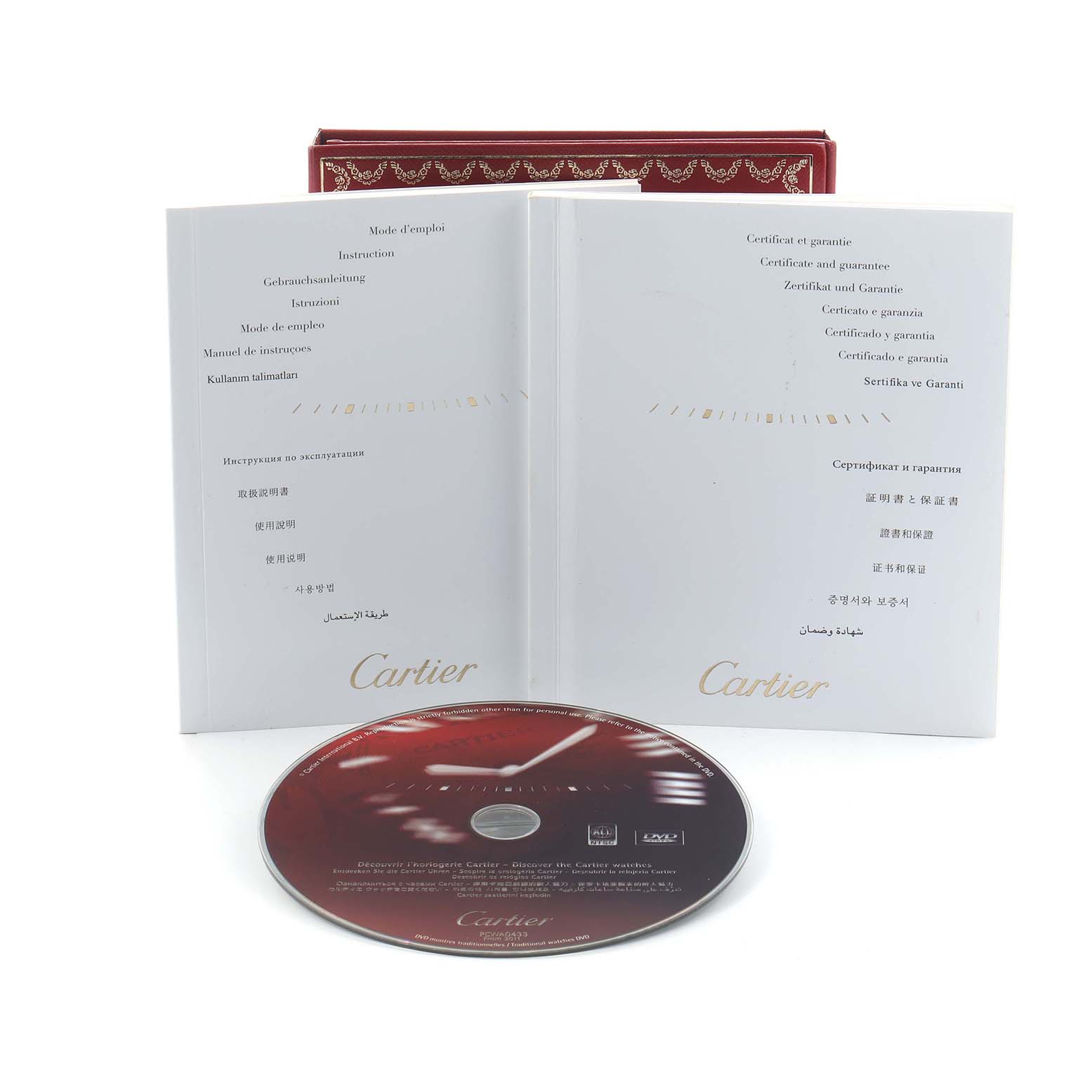 The image shows a Cartier Roadster W62025V3 Men
s Stainless Steel Silver Dial model
s instruction booklet and CD, viewed from the front.