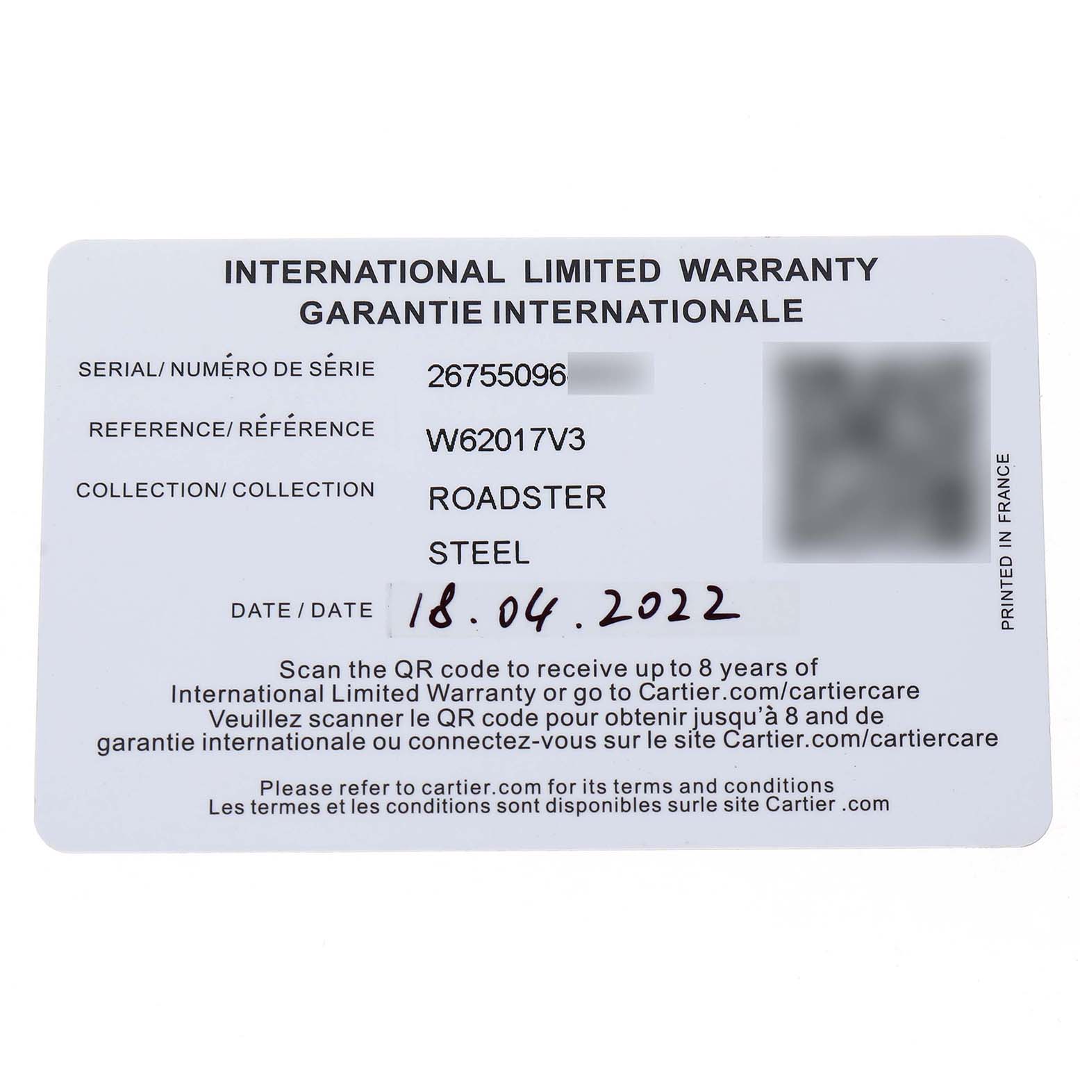 The image shows an International Limited Warranty card for the Cartier Roadster W62017V3 Women's Stainless Steel Pink Dial model.