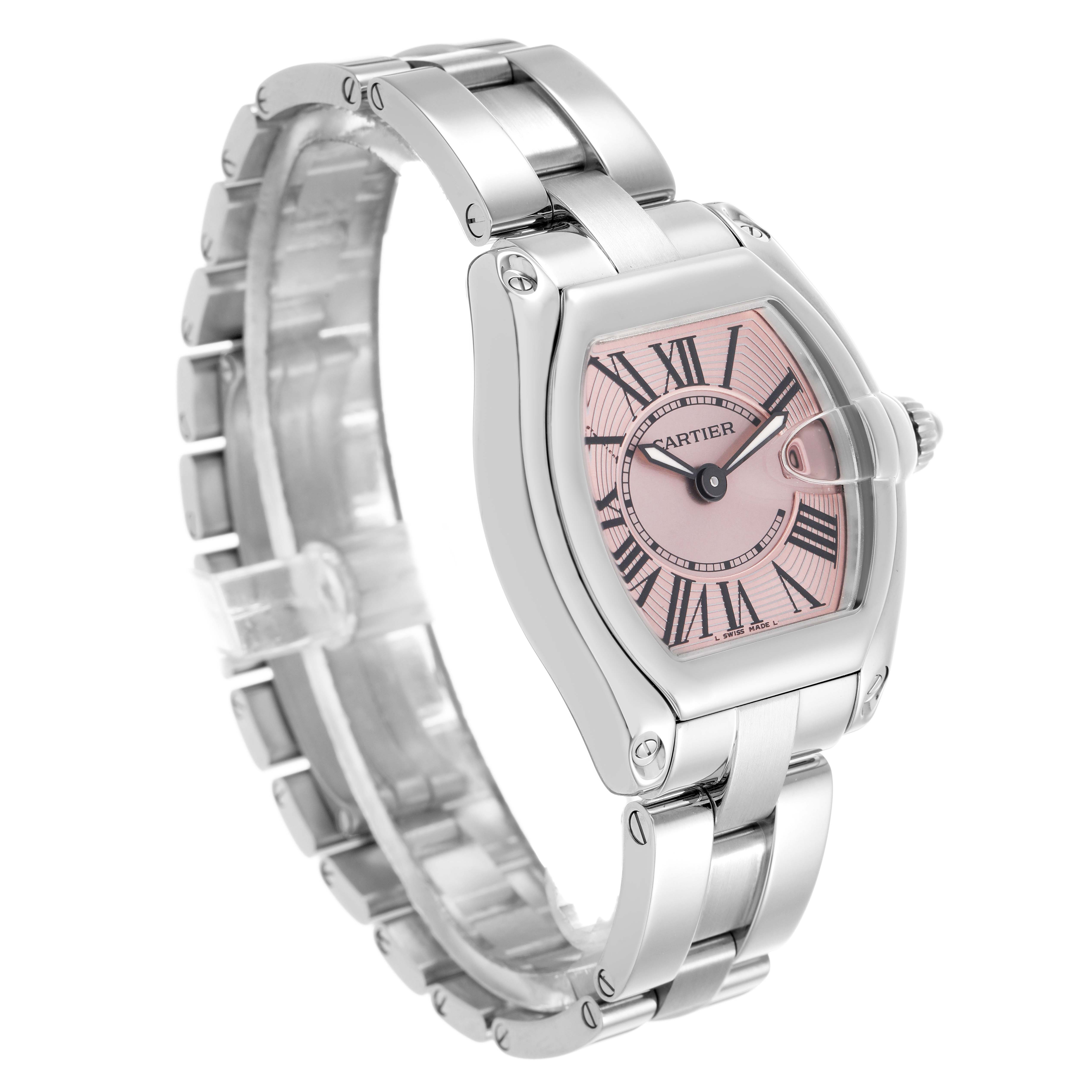 The Cartier Roadster W62017V3 Women's Stainless Steel Pink Dial watch is shown at a three-quarter angle, highlighting its pink dial and stainless steel bracelet.