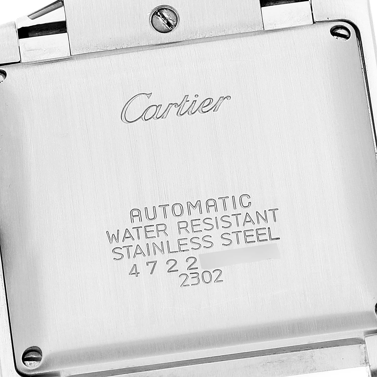 This image shows the back case of a Cartier Tank Francaise W51005Q4 Men's Steel and Gold (two tone) Silver Dial W51005Q4 Men's Steel and Gold (two tone) Silver Dial watch, displaying the brand name and specifications.