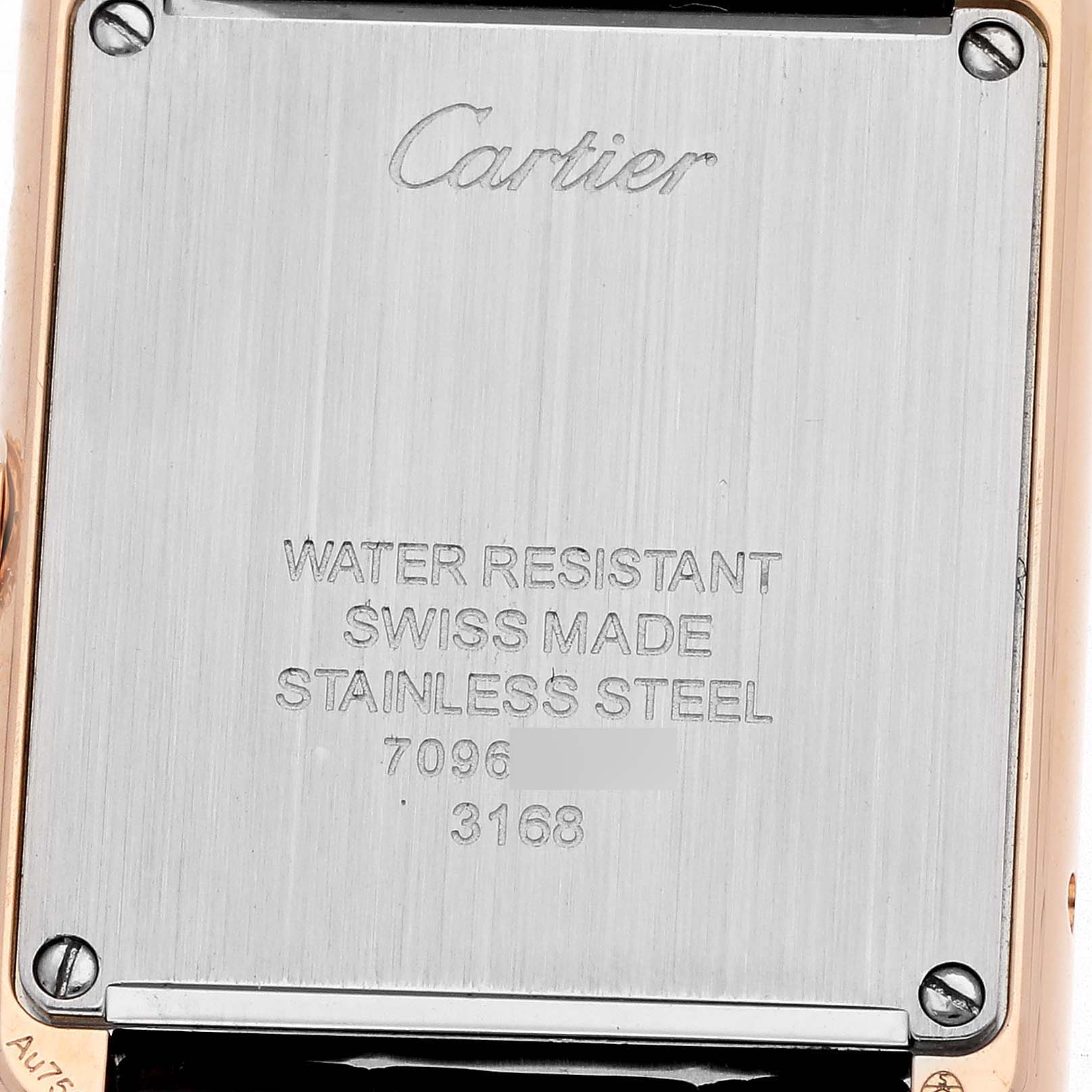 The image shows the back of a Cartier Tank Solo W5200024 Women's Rose Gold Silver Dial watch, highlighting the brand name, material, and water resistance details.