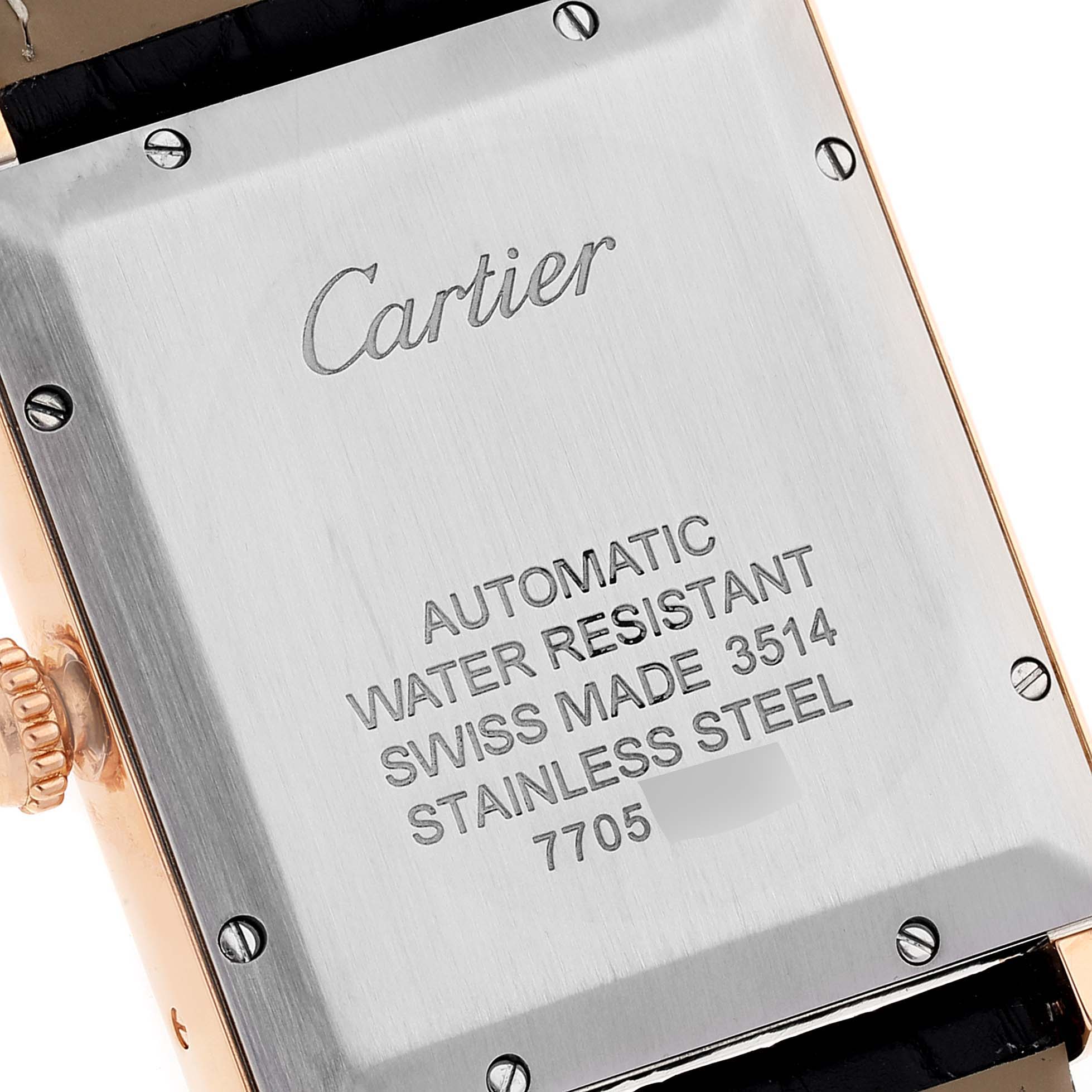 The image shows the back plate of a Cartier Tank Solo W5200026 Men's Rose Gold Silver Dial W5200026 Men's Rose Gold Silver Dial watch, highlighting the engraved brand name and specifications.