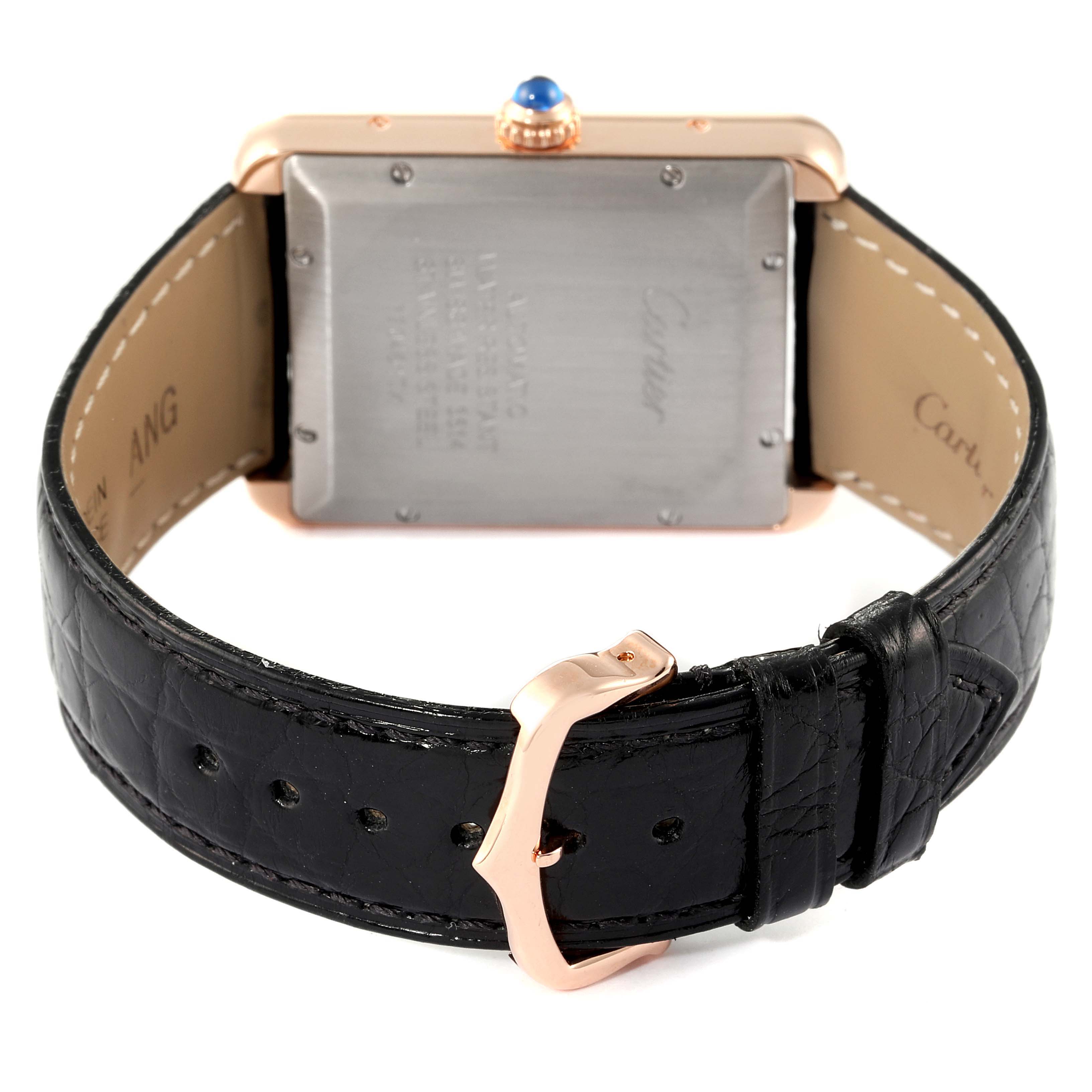 The Cartier Tank Solo W5200026 Men's Rose Gold Silver Dial W5200026 Men's Rose Gold Silver Dial watch is shown from the back, displaying its leather strap and clasp.