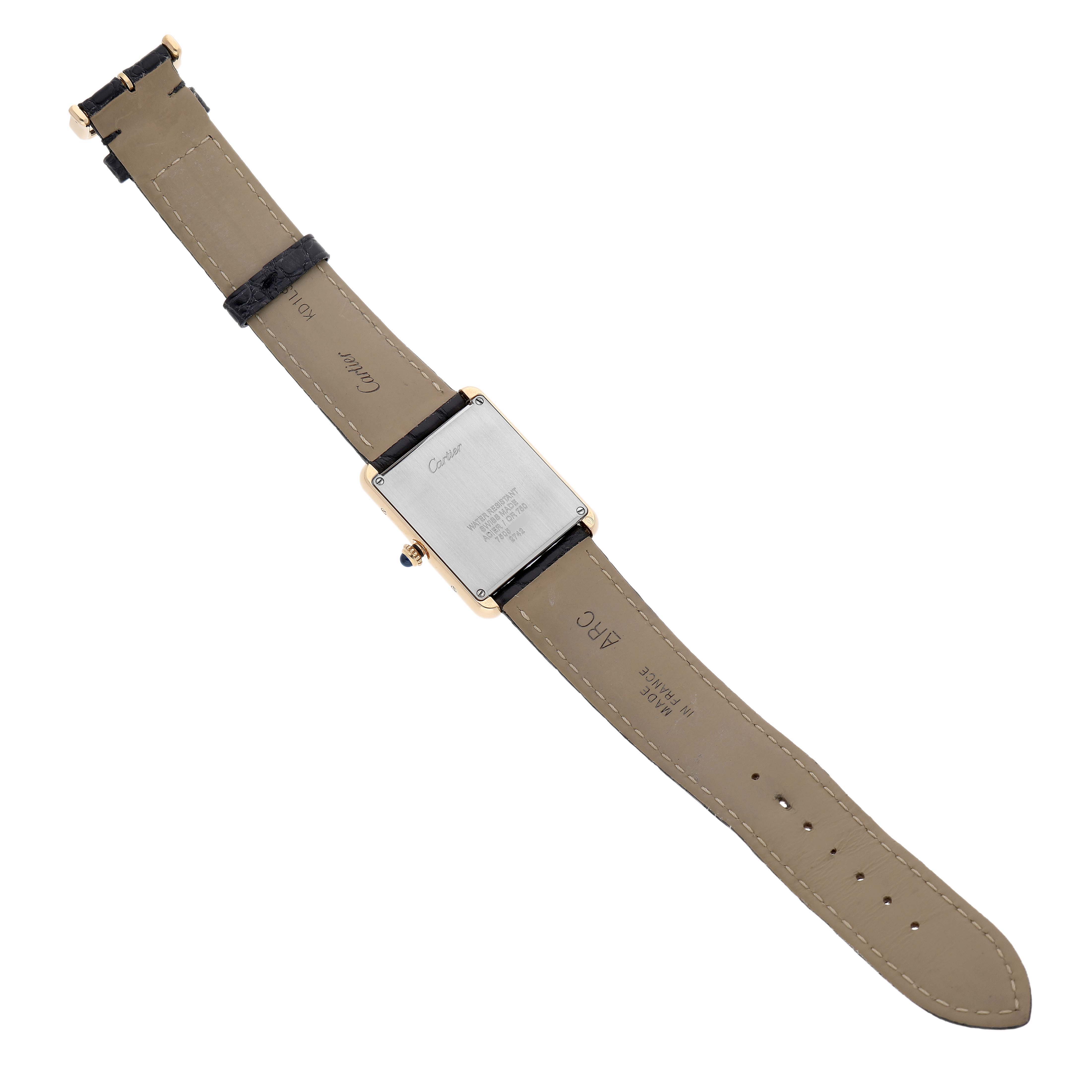 The image shows the back view of a Cartier Tank Solo W1018855 Men's Steel and Gold (two tone) Silver Dial watch, highlighting its strap and case back.