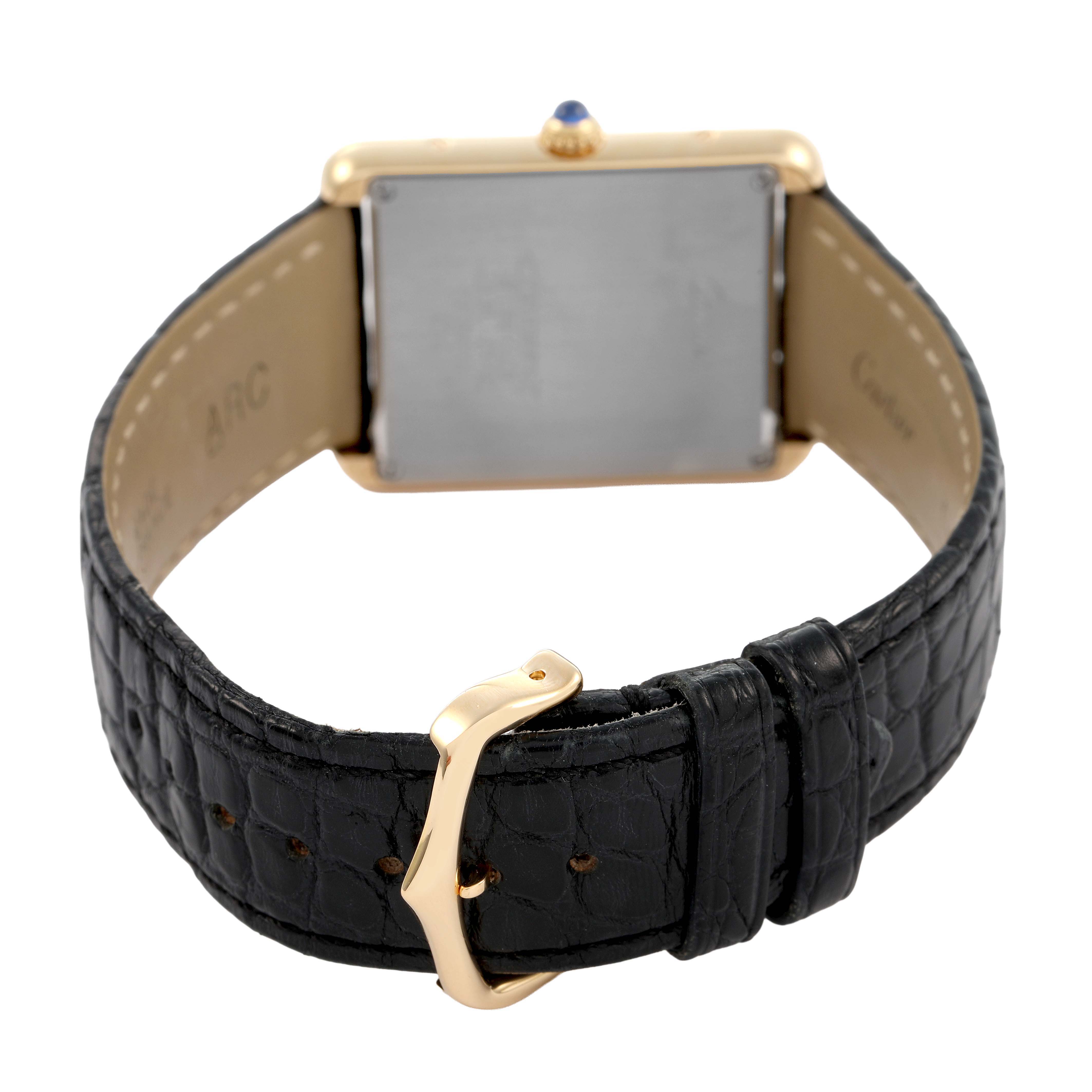 The image shows the back of a Cartier Tank Solo W1018855 Men's Steel and Gold (two tone) Silver Dial watch, highlighting the case, buckle, and leather strap.