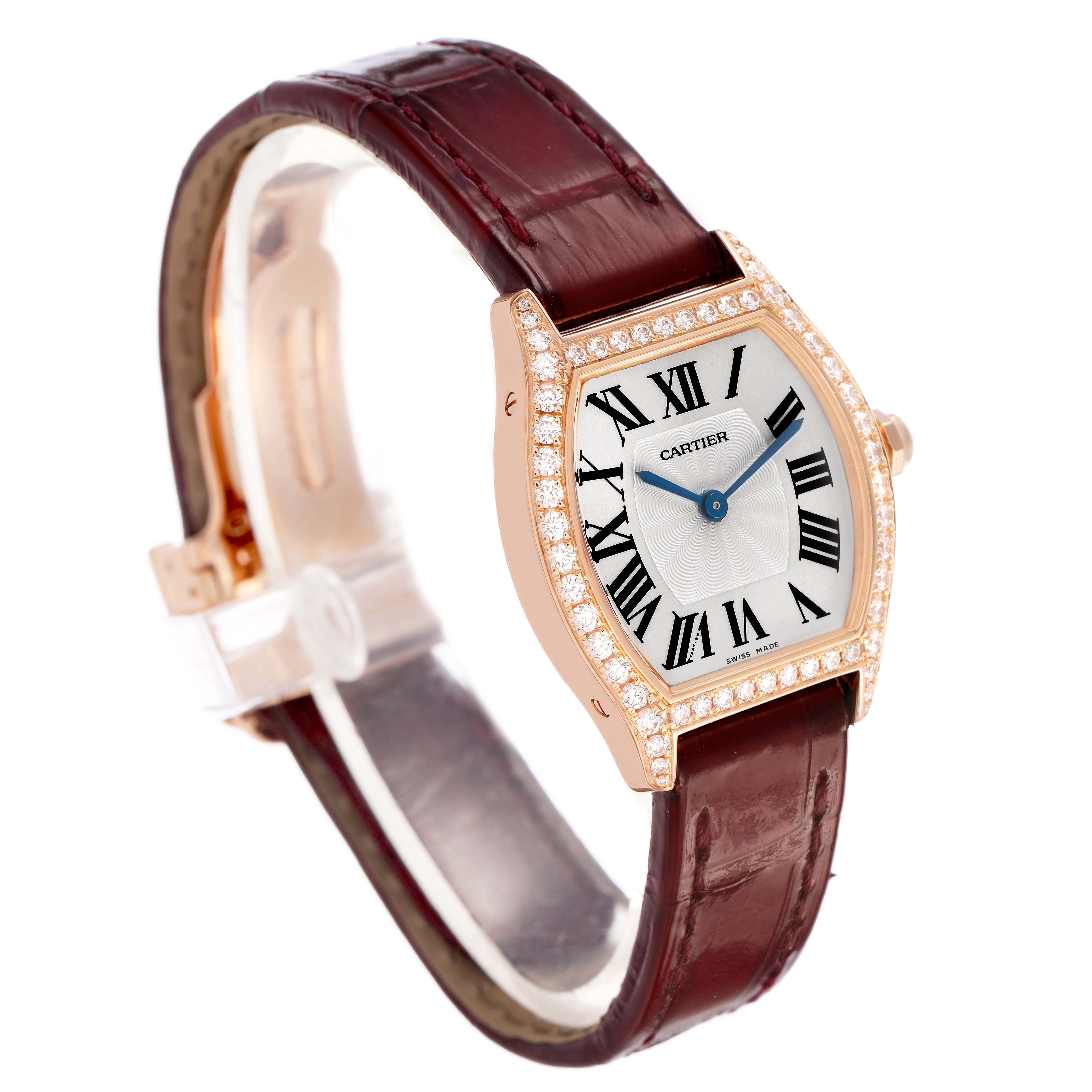 The Cartier Tortue WA501010 Women's Rose Gold Silver Dial watch is shown at a side angle highlighting the face, diamond bezel, and brown leather strap.