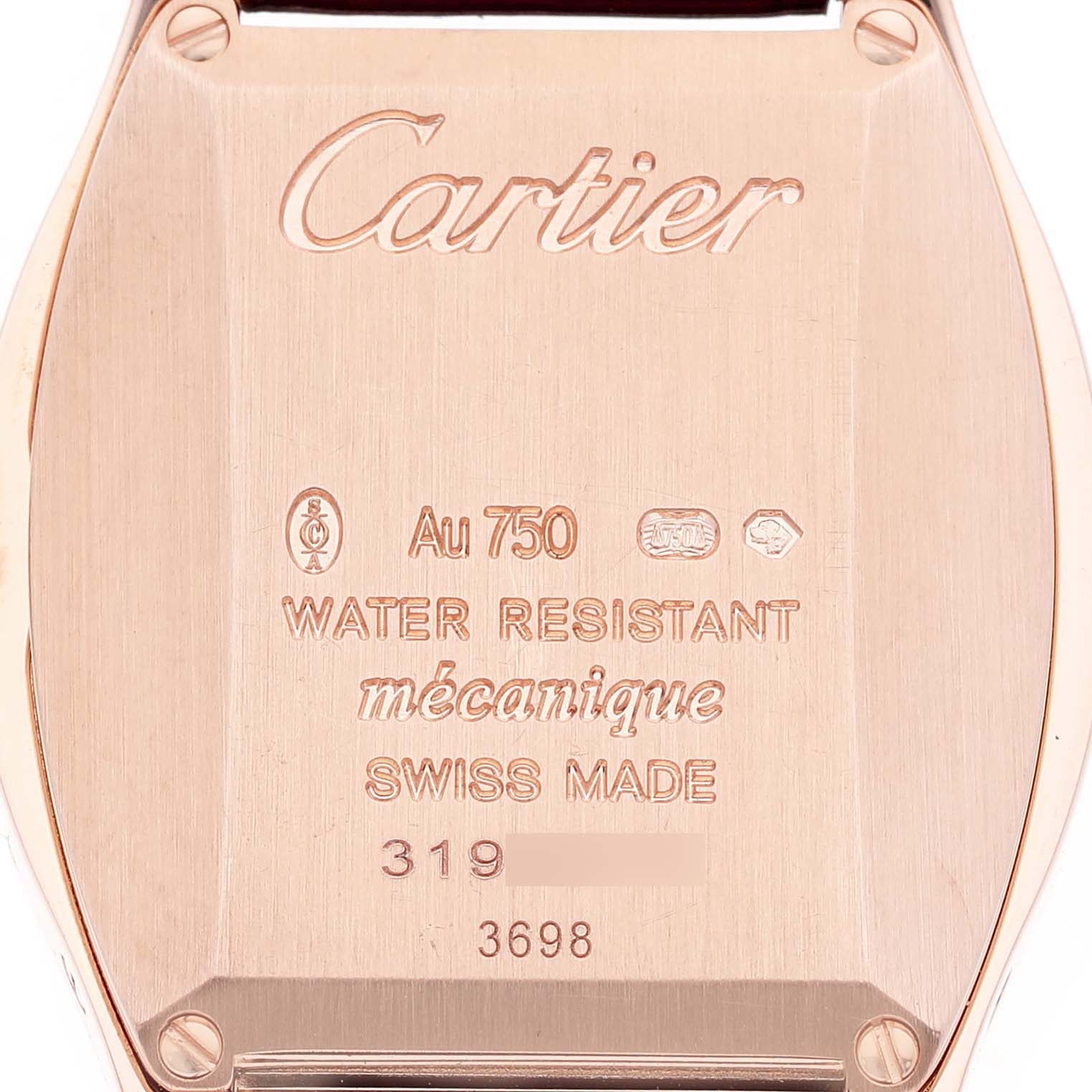 The image shows the back of a Cartier Tortue WA501010 Women's Rose Gold Silver Dial watch, displaying engravings and markings.