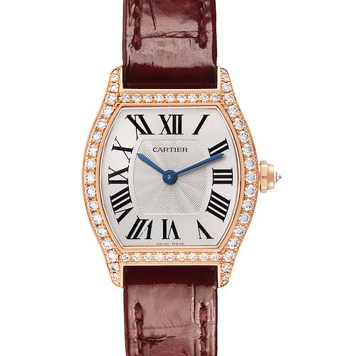 The Cartier Tortue WA501010 Women's Rose Gold Silver Dial watch is shown from a front angle, displaying the face, Roman numerals, diamond bezel, and leather strap.