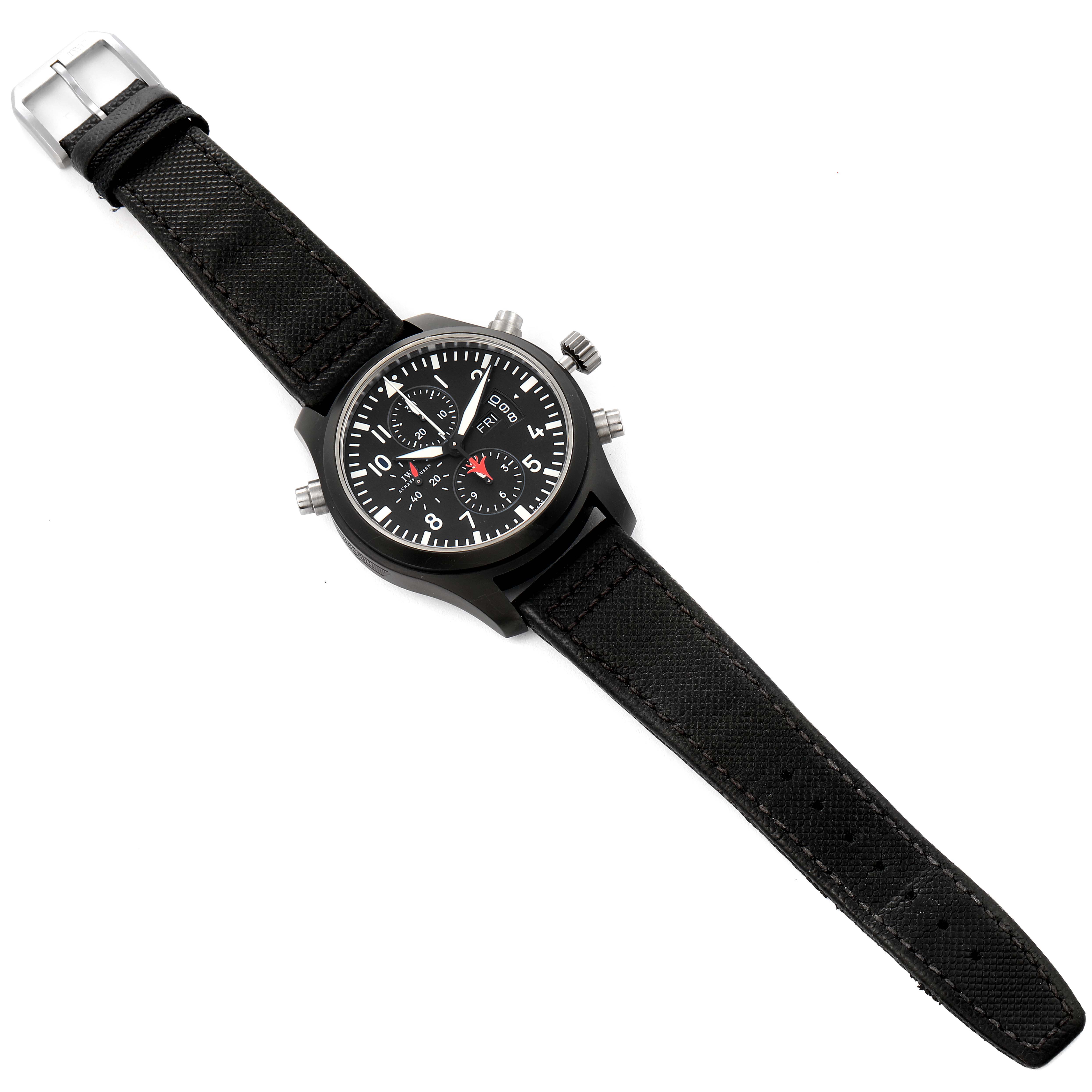 The IWC Pilot IW379901 Men's Ceramic Black Dial IW379901 Men's Ceramic Black Dial model watch is shown from a top-down angle, displaying its face, strap, and side buttons.