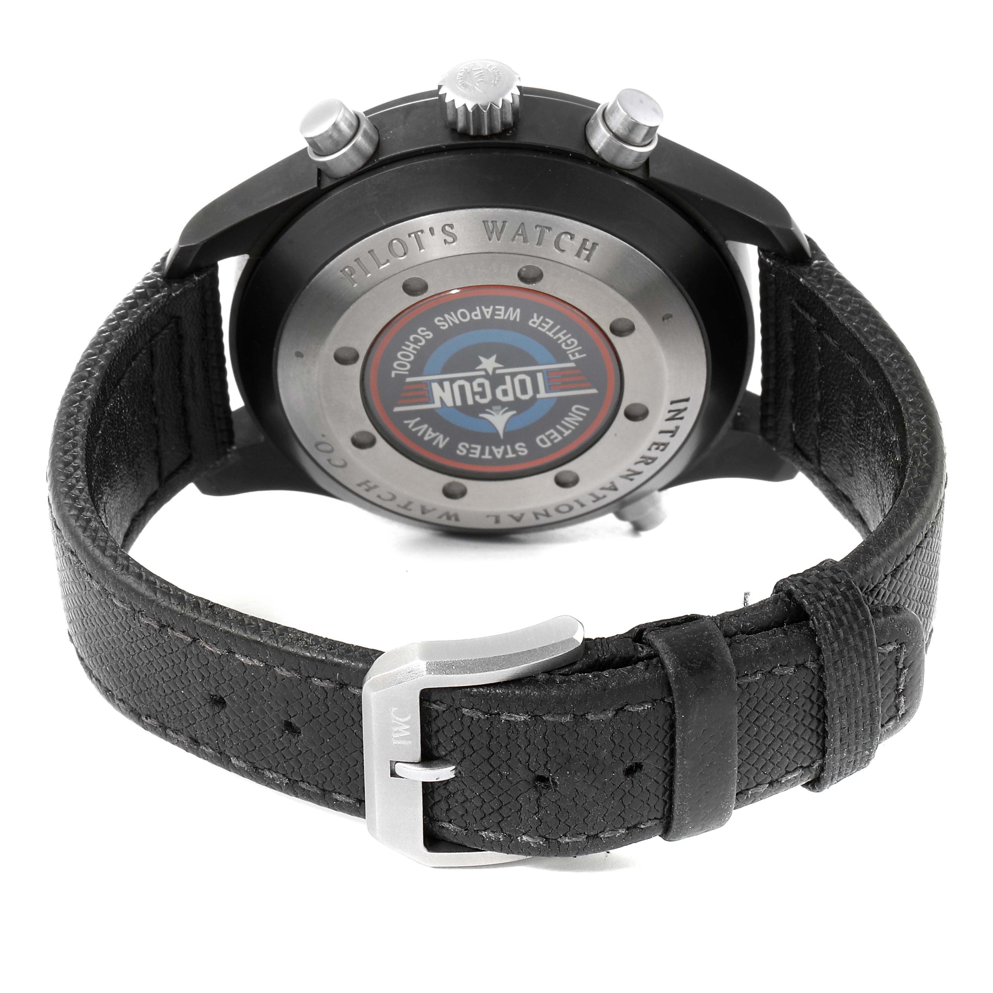 The image shows the back view of an IWC Pilot IW379901 Men's Ceramic Black Dial IW379901 Men's Ceramic Black Dial model watch, highlighting the case back and a portion of the leather strap with the buckle.