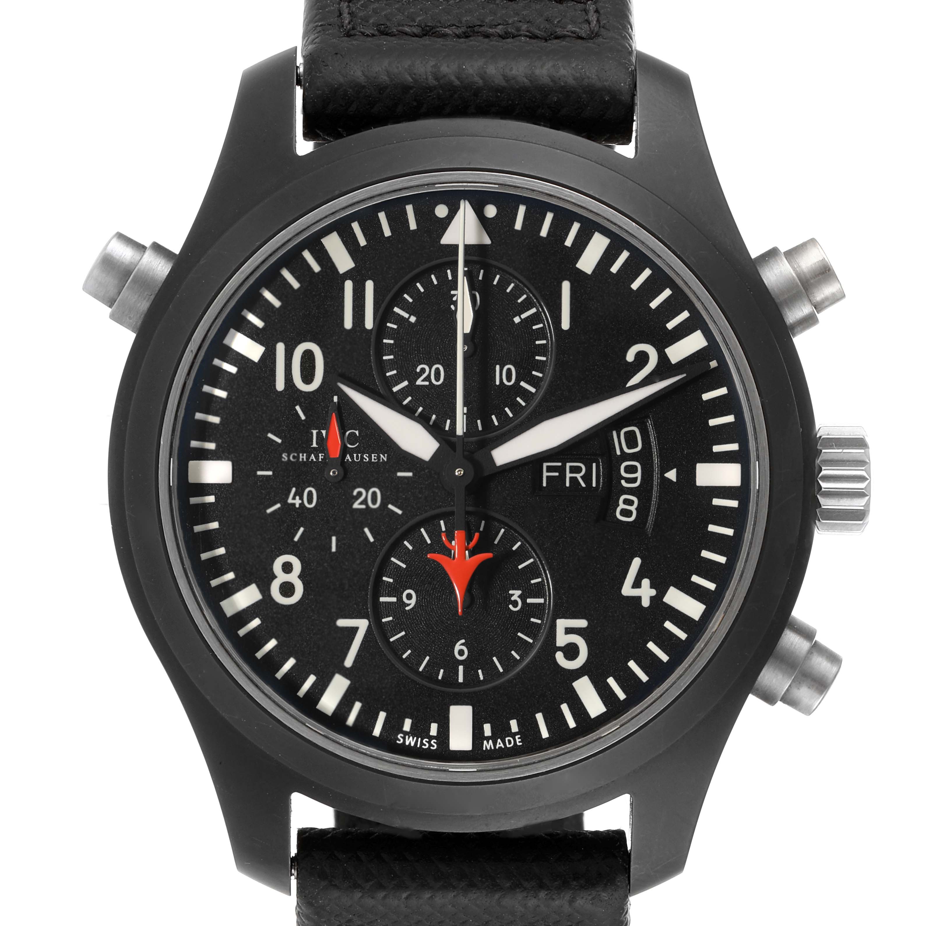 The IWC Pilot IW379901 Men's Ceramic Black Dial IW379901 Men's Ceramic Black Dial watch is shown from a top-down angle, showcasing the dial, crown, pushers, and strap.