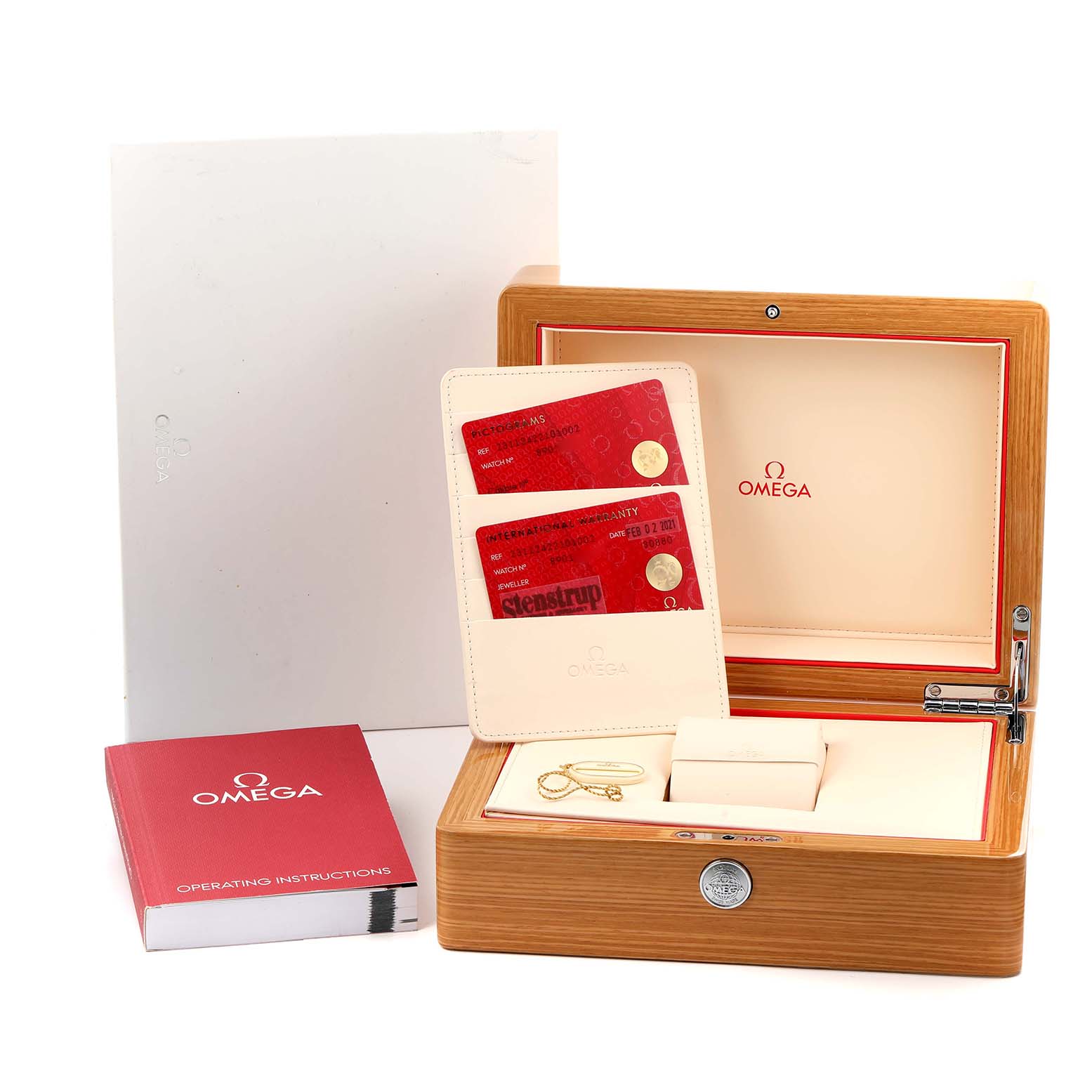 The image shows an Omega Aqua Terra 231.12.42.21.01.002 Men
s Stainless Steel Black Dial box, warranty cards, instructions, and additional accessories.