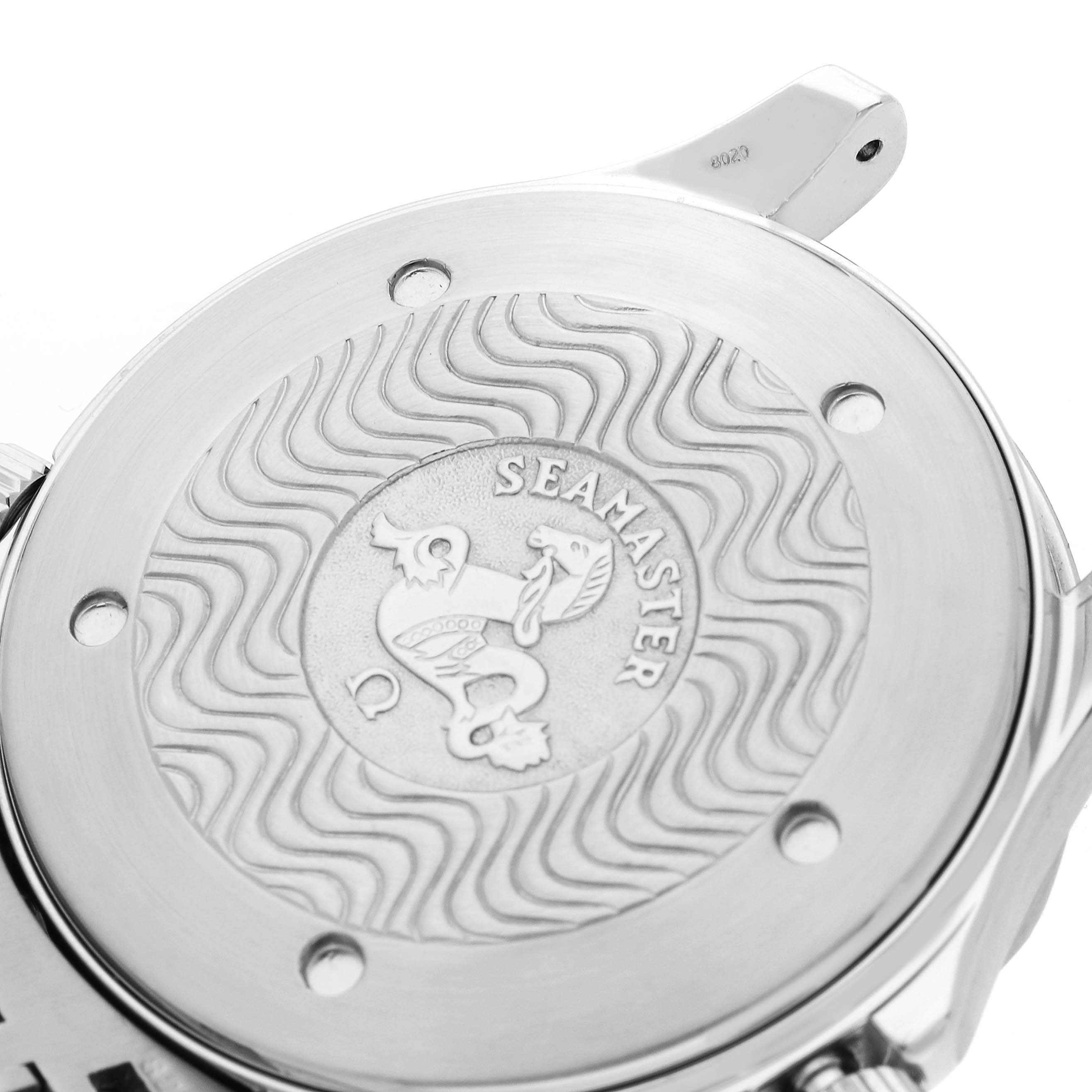 The image shows the case back of an Omega Seamaster 2254.50.00 Men
s Stainless Steel Black Dial, featuring the engraved logo and wave pattern from a slightly elevated angle.