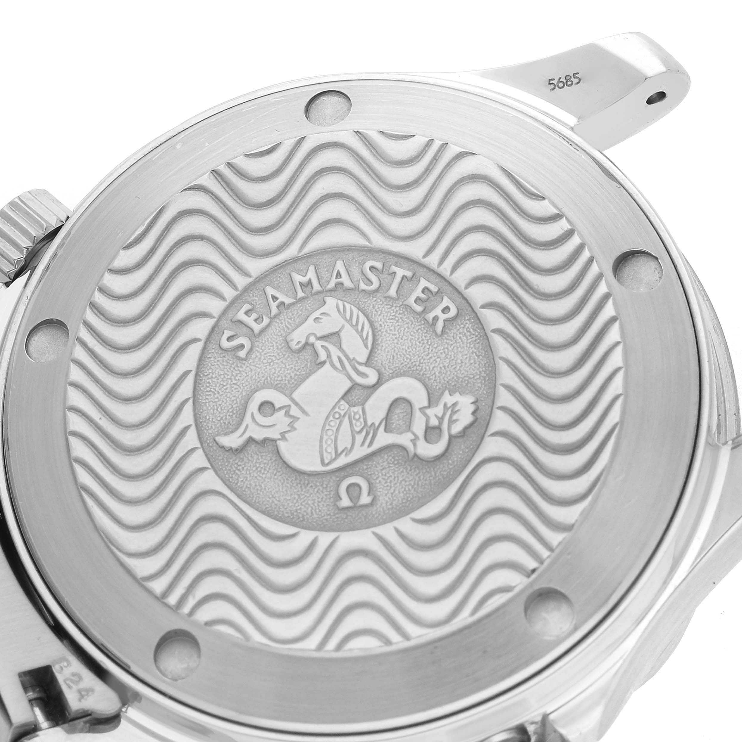 The image shows the engraved case back of an Omega Seamaster 2561.80.00 Men
s Stainless Steel Blue Dial watch from a close-up angle.