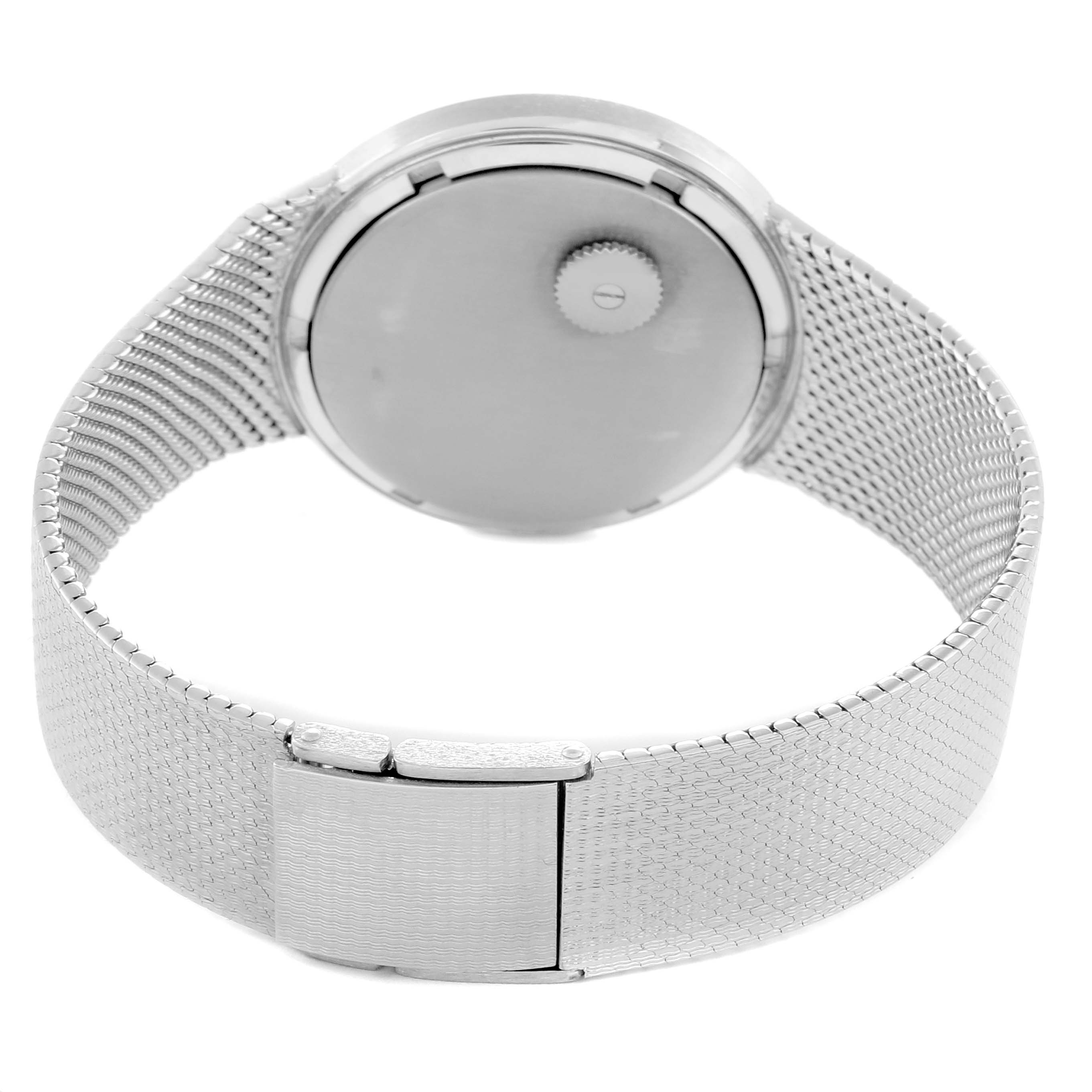 The image shows the back of the Patek Philippe Vintage 3569 Men
s White Gold Blue Dial watch, highlighting the case back, crown, and clasp.