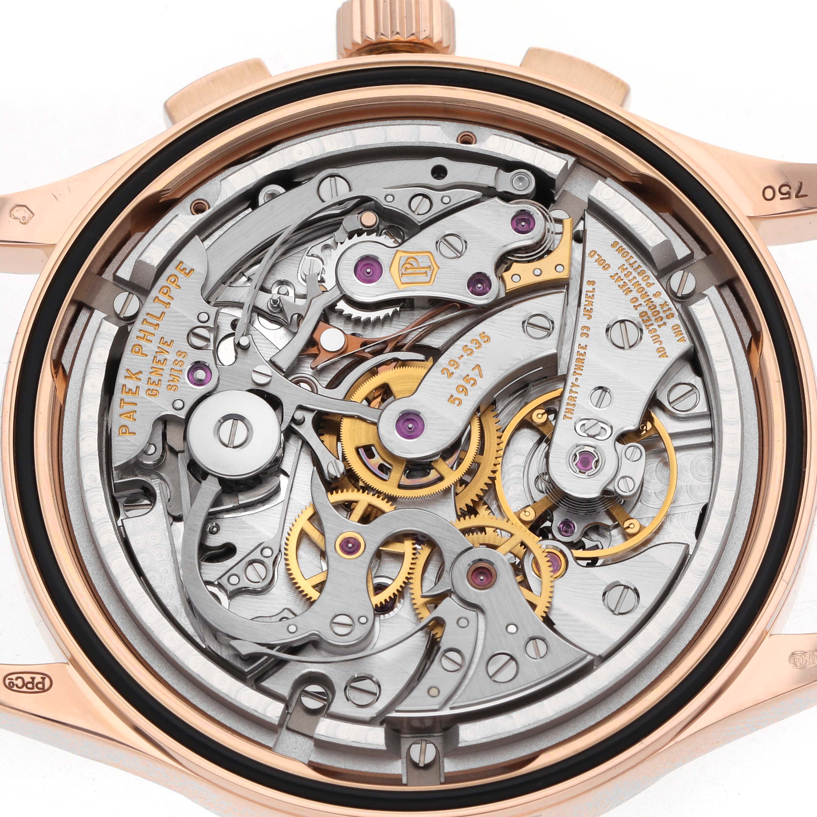 The image shows a detailed view of the movement of a Patek Philippe Complications 5170 Men
s Rose Gold Black Dial watch, highlighting gears and components.