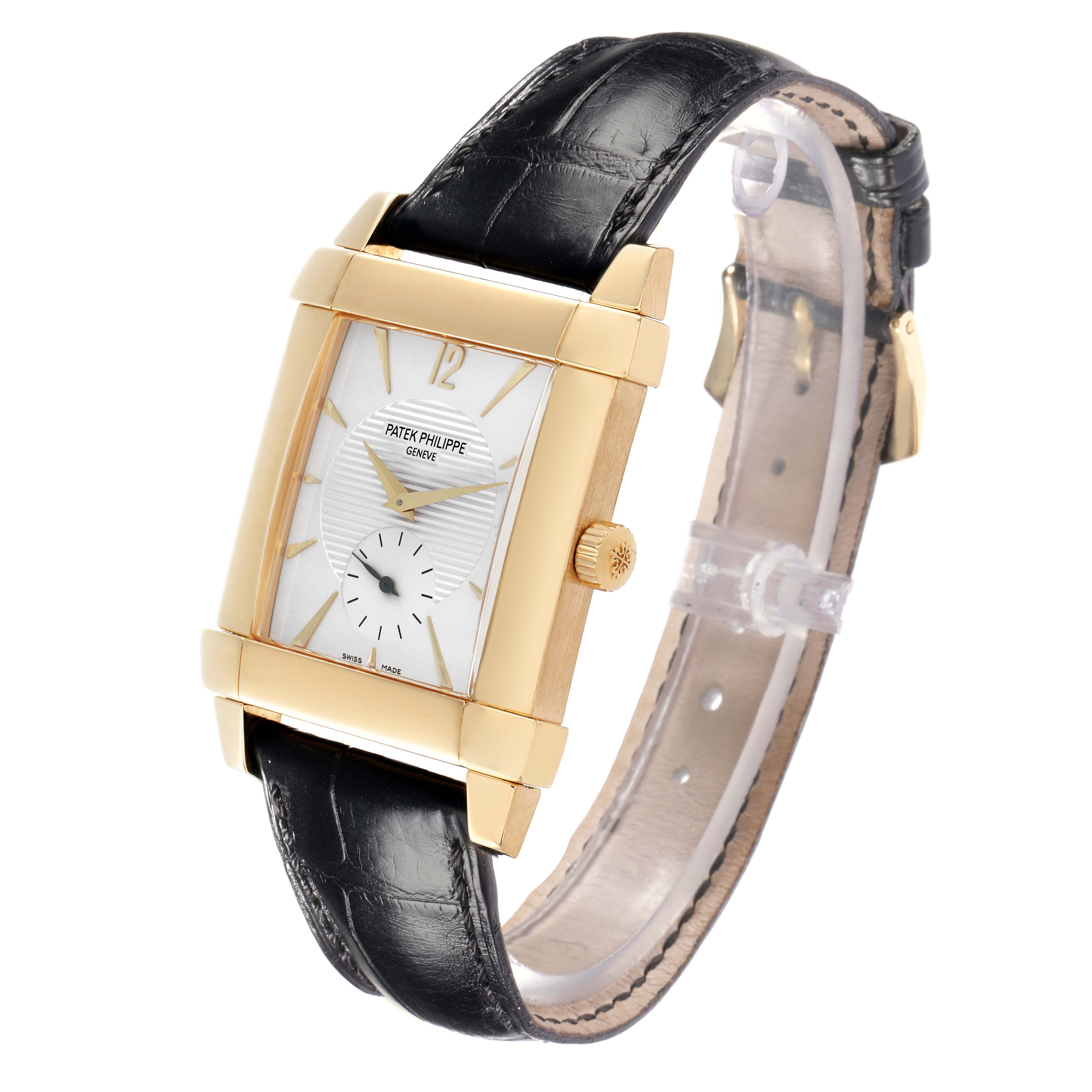 The Patek Philippe Gondolo 5111J-001 Men
s Yellow Gold Silver Dial watch is shown at a slight angle, highlighting its gold case, white dial, and black leather strap.