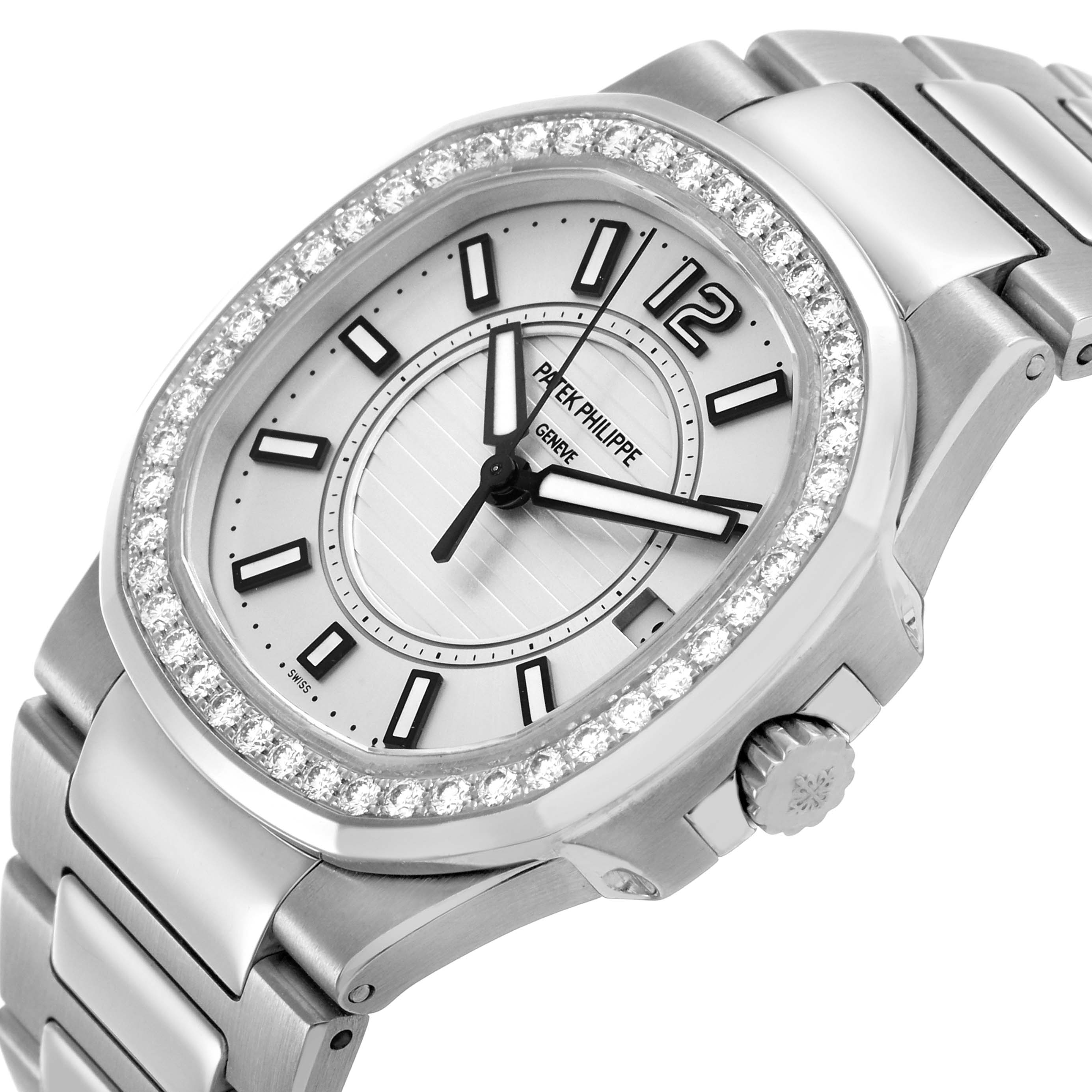 The Patek Philippe Nautilus 7010/1G-001 Women's White Gold Silver Dial watch is shown from a high-angle, highlighting the diamond-set bezel, dial, and crown.