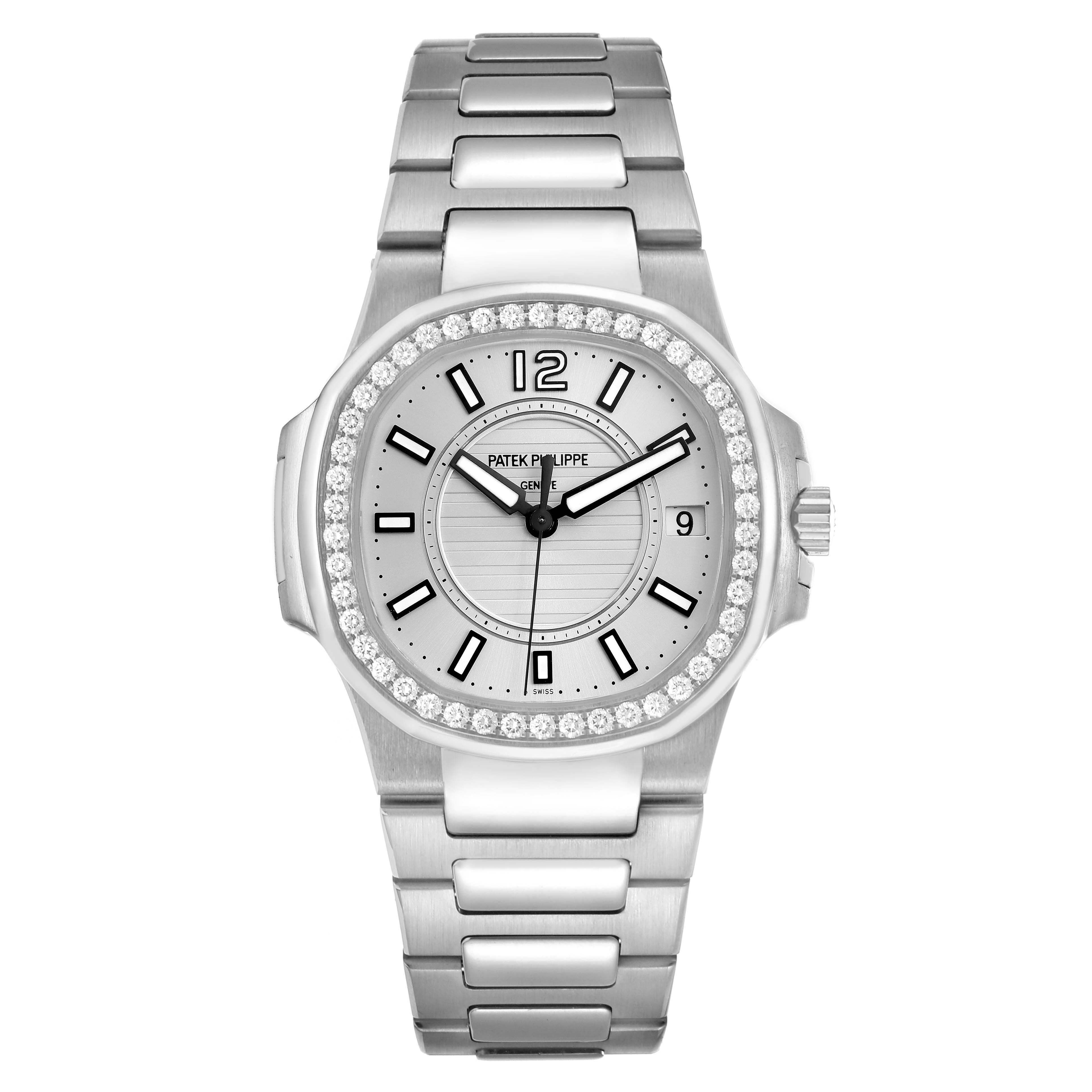 The Patek Philippe Nautilus 7010/1G-001 Women's White Gold Silver Dial watch is shown from a top-down angle, displaying its face, bezel, and bracelet clearly.