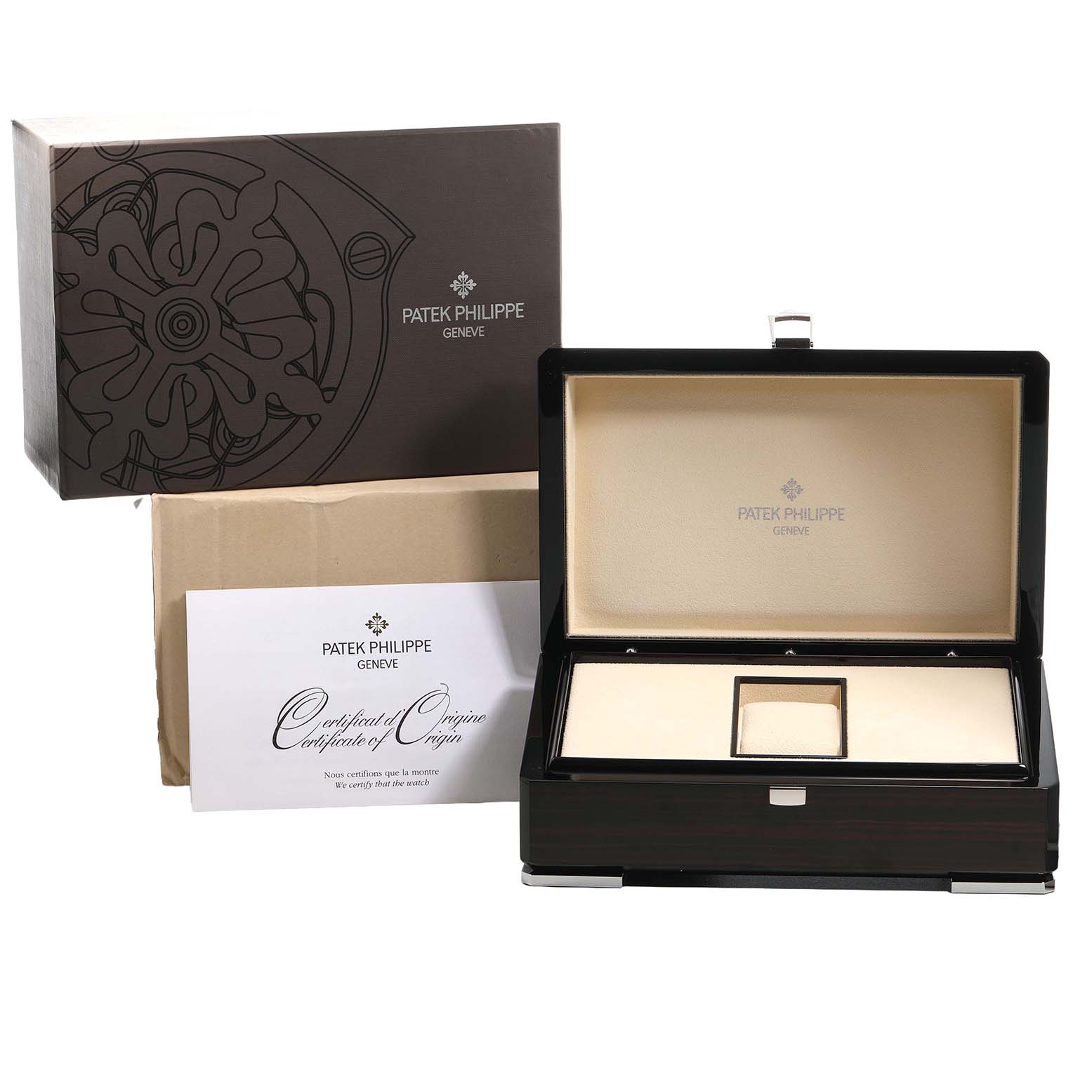 The image shows the packaging and presentation box for a Patek Philippe Nautilus 7010/1G-001 Women's White Gold Silver Dial watch, including a certificate of origin.