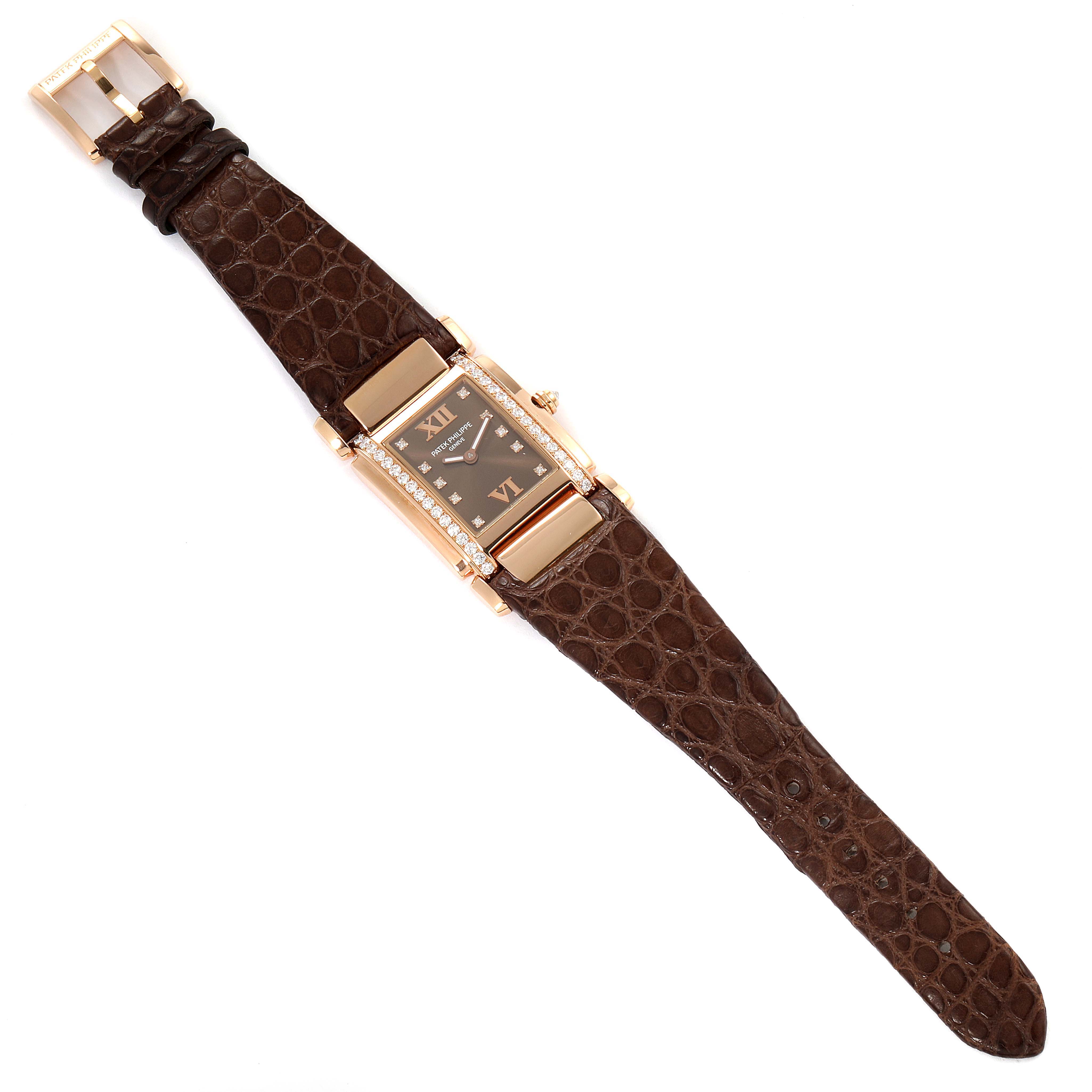 The Patek Philippe Twenty-4 4920R-10 Women's Rose Gold Brown Dial 4920R-10 Women's Rose Gold Brown Dial watch is shown at a top-down angle, highlighting its face, case, and strap.