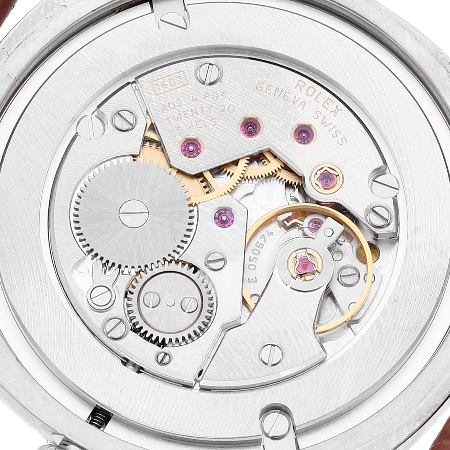 The image shows the intricate inner movement and mechanisms of the Rolex Cellini 4233 Men's Rose Gold Black Dial 4233 Men's Rose Gold Black Dial watch from a back view.