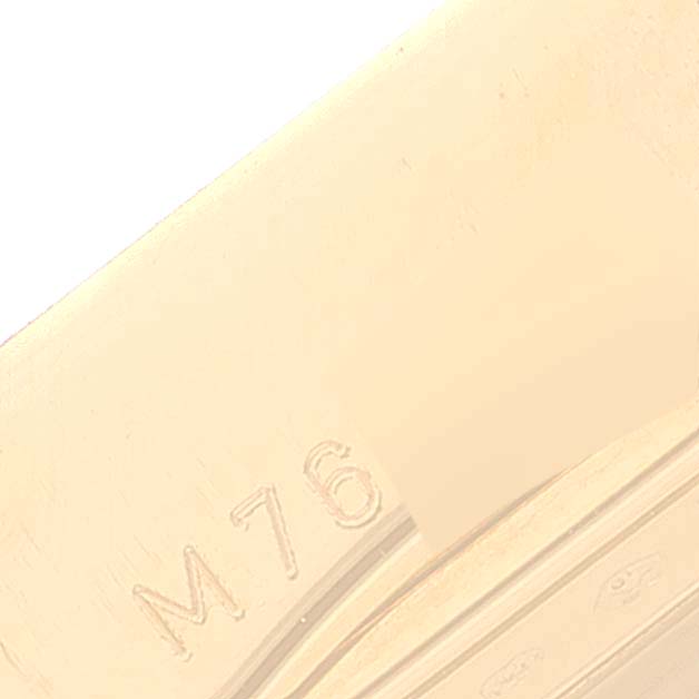 The image shows a close-up of the case back with a visible serial number of a Rolex Cellini 5440/8 Men's Yellow Gold Champagne Dial 5440/8 Men's Yellow Gold Champagne Dial model.