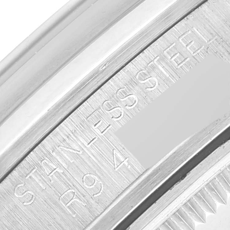This image shows a close-up of the stainless steel caseback edge of a Rolex Date 15000 Men's Stainless Steel Silver Dial 15000 Men's Stainless Steel Silver Dial model watch.