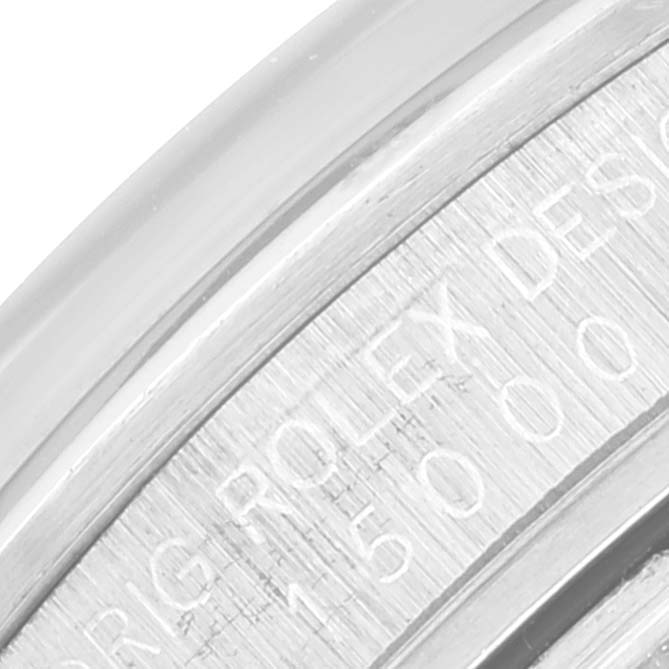 The image shows a close-up of the bezel and engraved serial number on a Rolex Date 15000 Men's Stainless Steel Silver Dial 15000 Men's Stainless Steel Silver Dial model watch.
