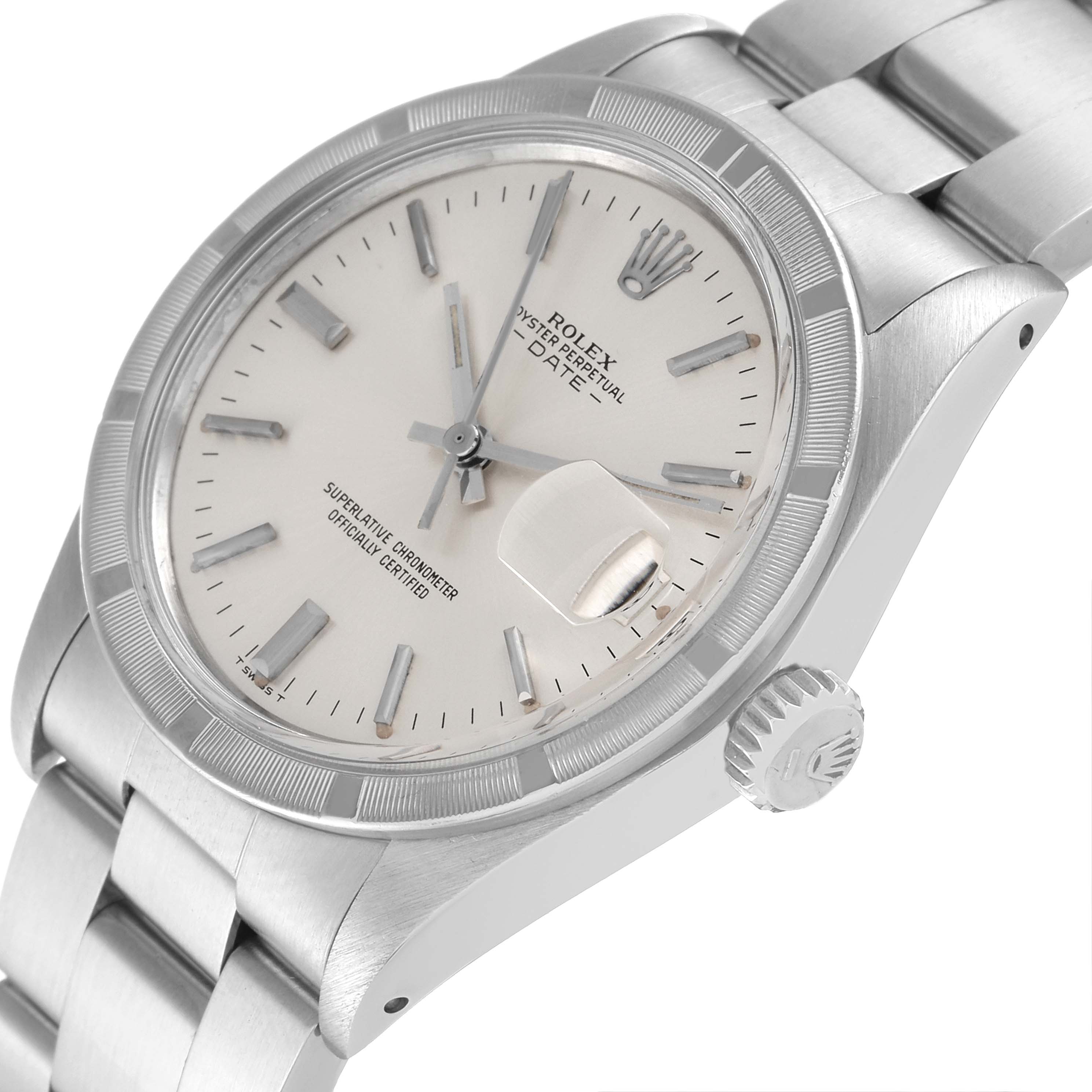 This image shows a side view of the Rolex Vintage Collection 1501 Men's Stainless Steel Silver Dial 1501 Men's Stainless Steel Silver Dial watch, focusing on the dial, crown, and part of the bracelet.